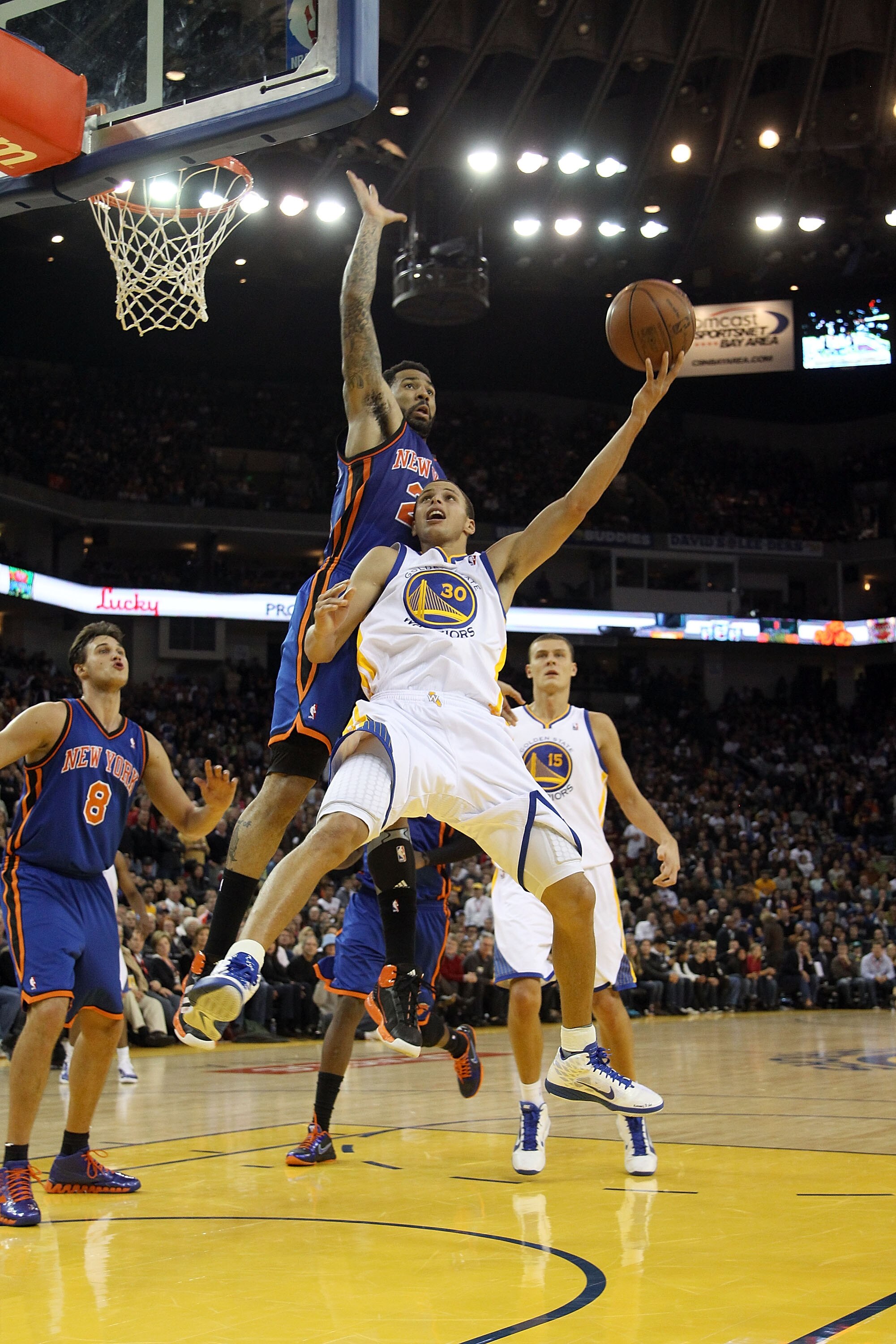 OAKLAND, CA - NOVEMBER 19:  Stephen Curry #30 of the Golden State Warriors in action against the New York Knicks at Oracle Arena on November 19, 2010 in Oakland, California. NOTE TO USER: User expressly acknowledges and agrees that, by downloading and or