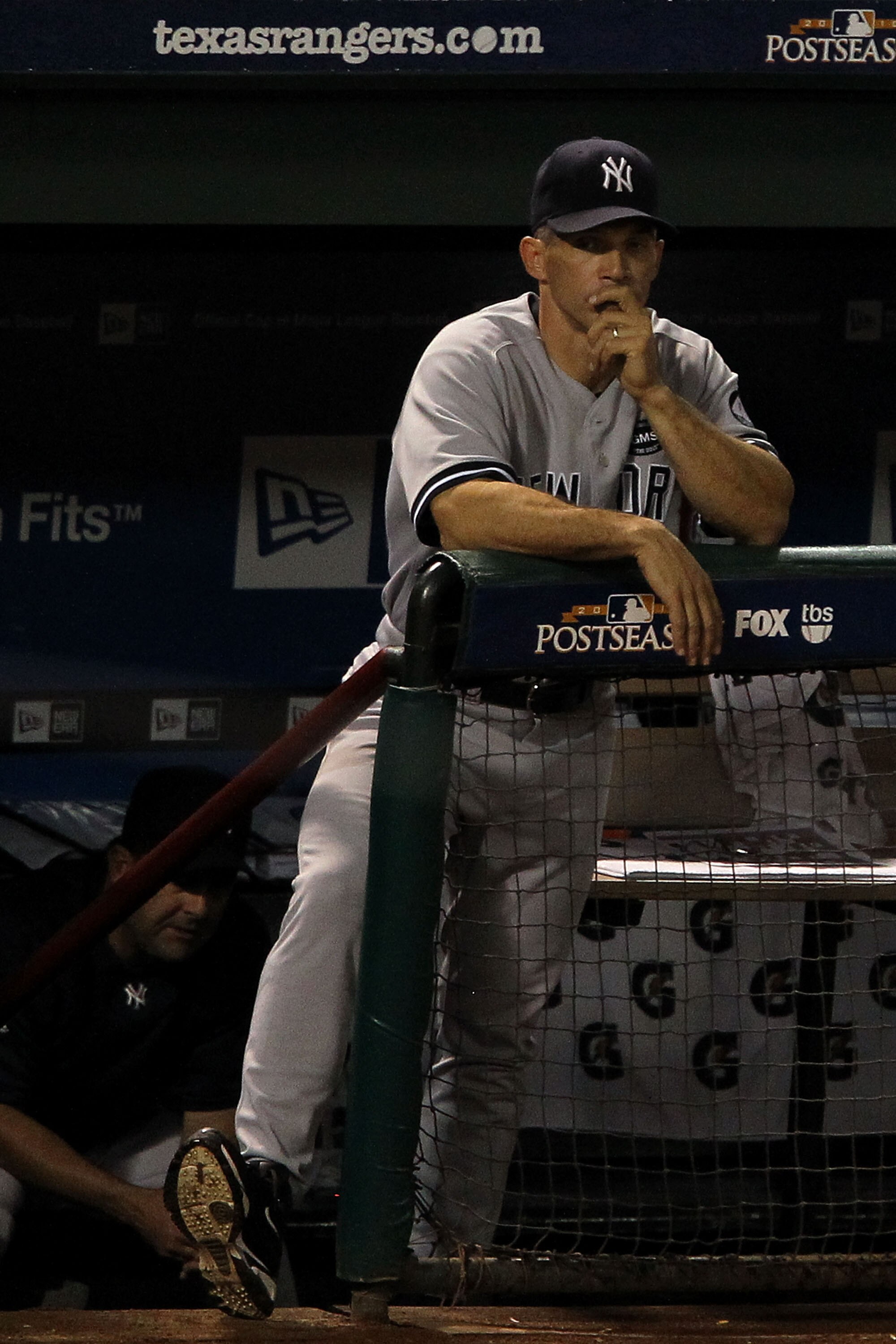ARLINGTON, TX - OCTOBER 22:  Manager Joe Girardi of the New York Yankees looks on during Game Six of the ALCS against the Texas Rangers during the 2010 MLB Playoffs at Rangers Ballpark in Arlington on October 22, 2010 in Arlington, Texas.  (Photo by Ronal