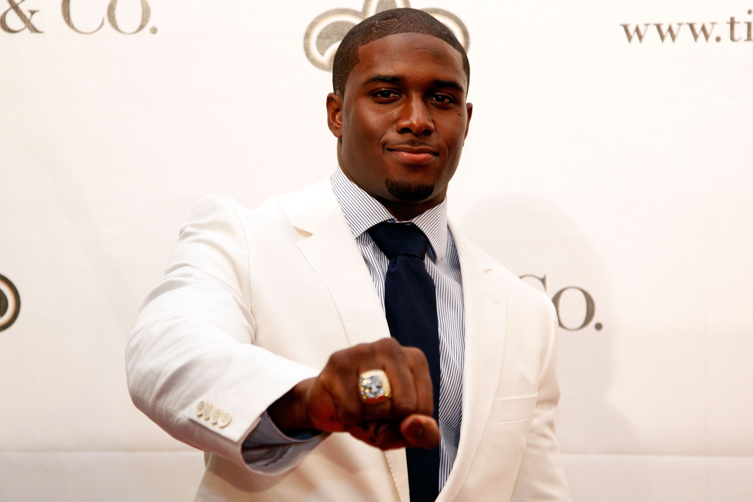 NEW ORLEANS - JUNE 16: Reggie Bush of the New Orleans Saints shows off his ring from Super Bowl XLIV on June 16, 2010 in New Orleans, Louisiana. (Photo by Chris Graythen/Getty Images) NEW ORLEANS - JUNE 16: Reggie Bush of the New Orleans Saints shows off his ring from Super Bowl XLIV on June 16, 2010 in New Orleans, Louisiana. (Photo by Chris Graythen/Getty Images)