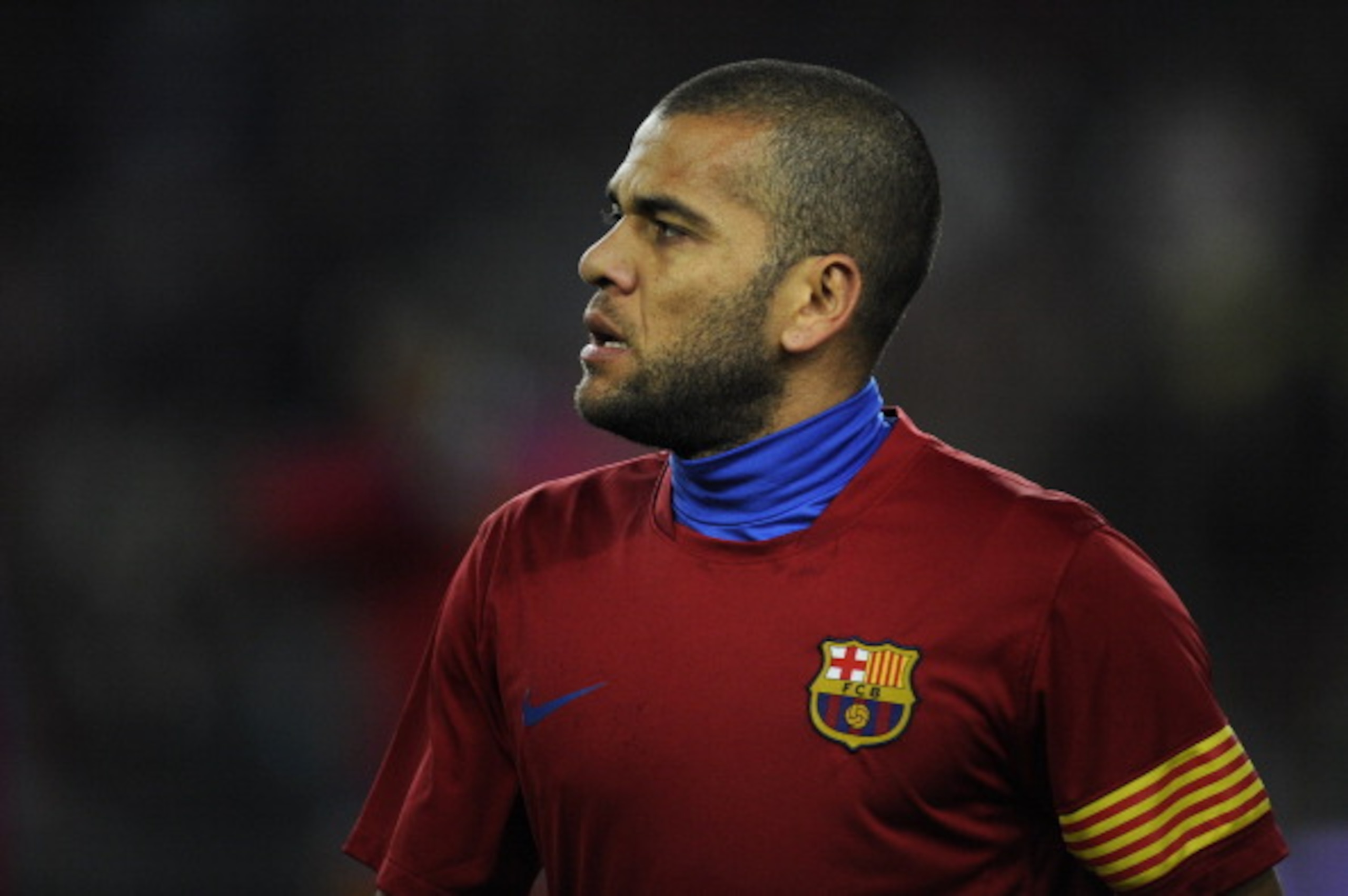 BARCELONA, SPAIN - JANUARY 02: Dani Alves of Barcelona looks on during the warm up prior the La Liga match between Barcelona and Levante UD at Camp Nou on January 2, 2011 in Barcelona, Spain. Barcelona won 2-1. (Photo by David Ramos/Getty Images) BARCELONA, SPAIN - JANUARY 02: Dani Alves of Barcelona looks on during the warm up prior the La Liga match between Barcelona and Levante UD at Camp Nou on January 2, 2011 in Barcelona, Spain. Barcelona won 2-1. (Photo by David Ramos/Getty Images)