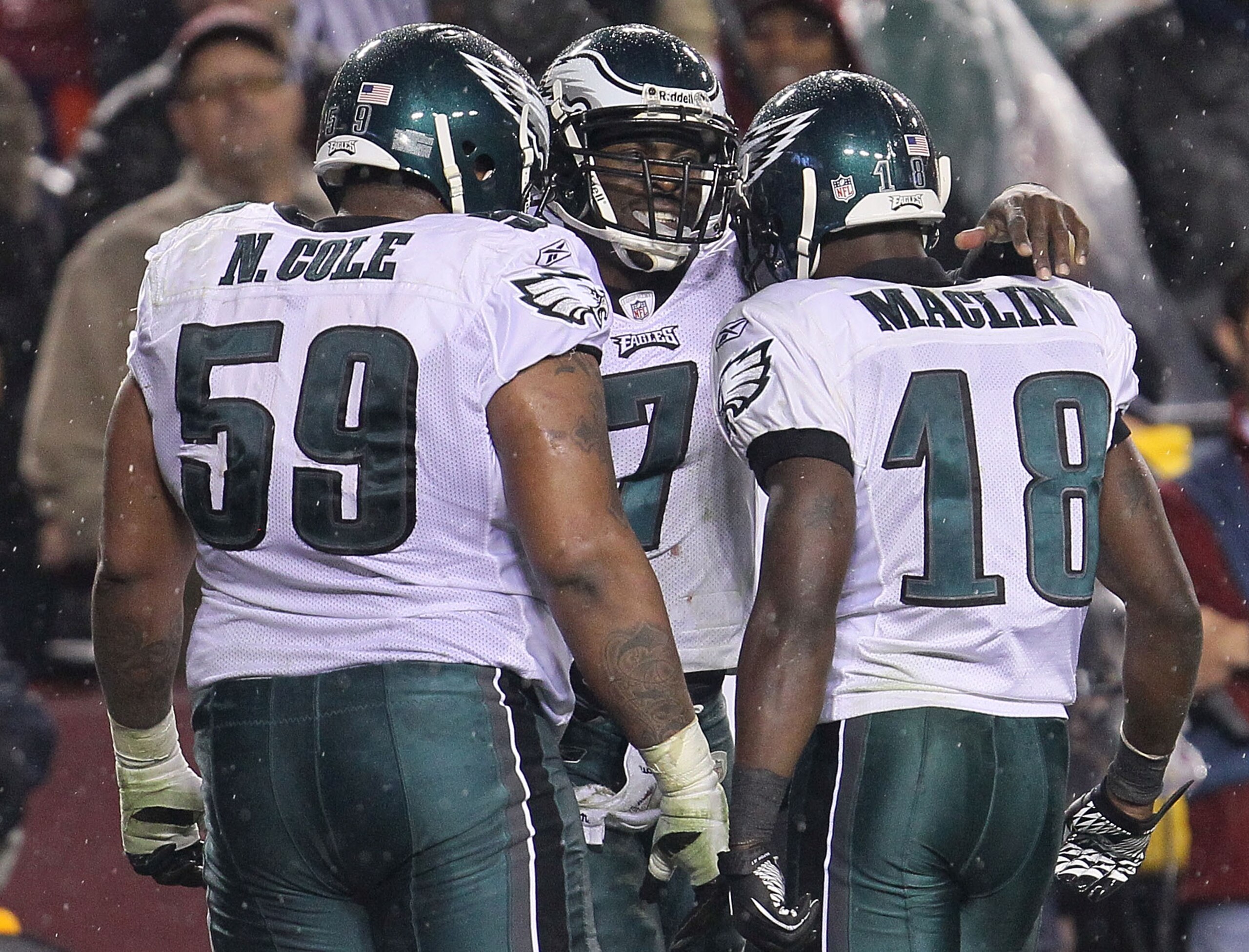 LANDOVER, MD - NOVEMBER 15: Michael Vick #7 of the Philadelphia Eagles celebrates his second touchdown with team mates Nick Cole #59 and Jeremy Maclin #18 against the Washington Redskins on November 15, 2010 at FedExField in Landover, Maryland. (Photo b LANDOVER, MD - NOVEMBER 15: Michael Vick #7 of the Philadelphia Eagles celebrates his second touchdown with team mates Nick Cole #59 and Jeremy Maclin #18 against the Washington Redskins on November 15, 2010 at FedExField in Landover, Maryland. (Photo b