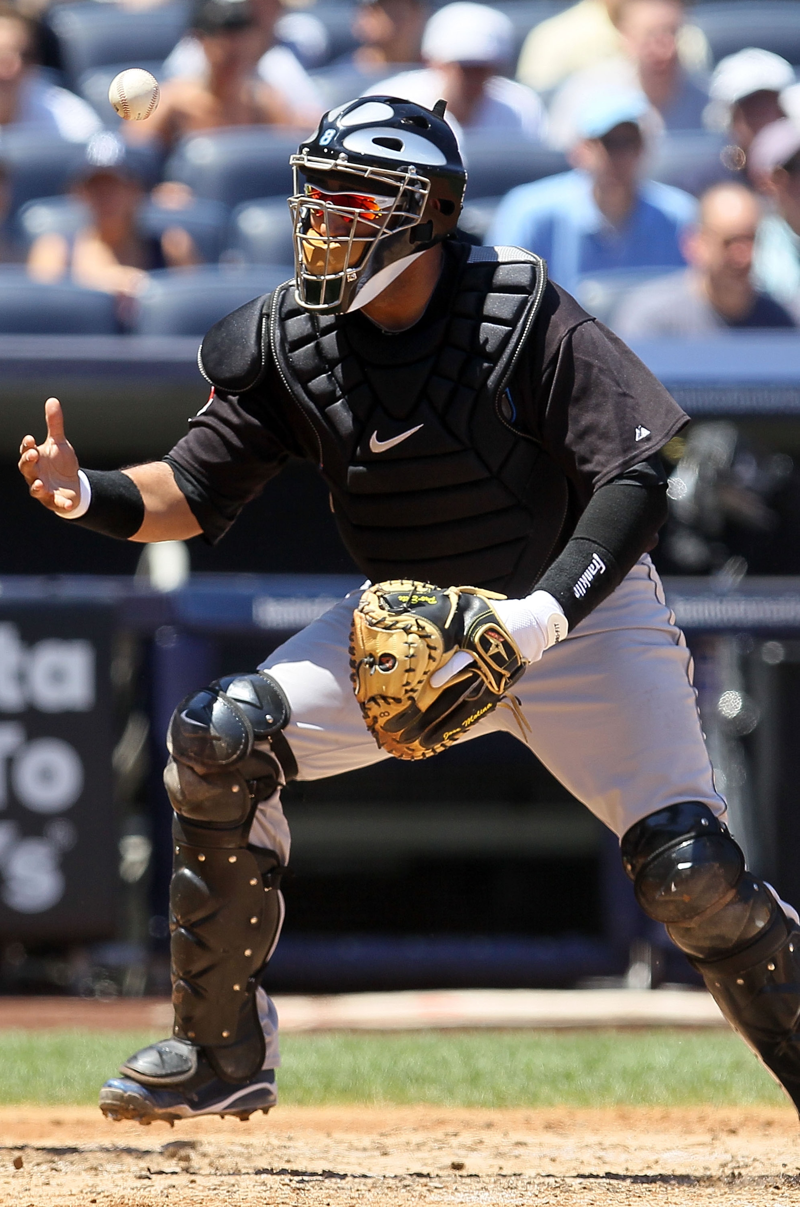 NEW YORK - JULY 04:  Jose Molina #8 of the Toronto Blue Jays in action against the New York Yankees on July 4, 2010 at Yankee Stadium in the Bronx borough of New York City.  (Photo by Jim McIsaac/Getty Images)