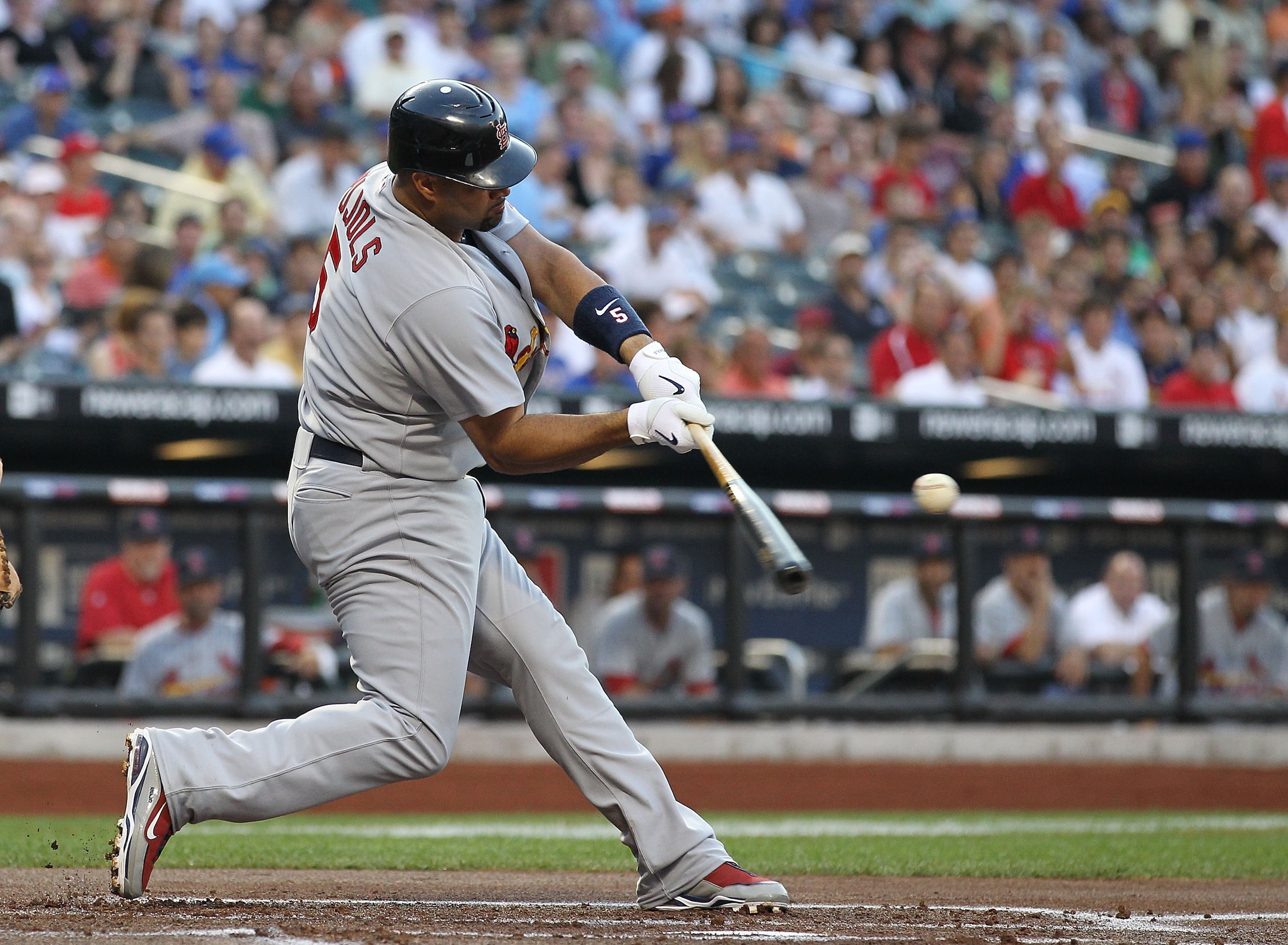 NEW YORK - JULY 27:  Albert Pujols #5 of the St. Louis Cardinals flies out against the New York Mets during their game on July 27, 2010 at Citi Field in the Flushing neighborhood of the Queens borough of New York City.  (Photo by Al Bello/Getty Images)