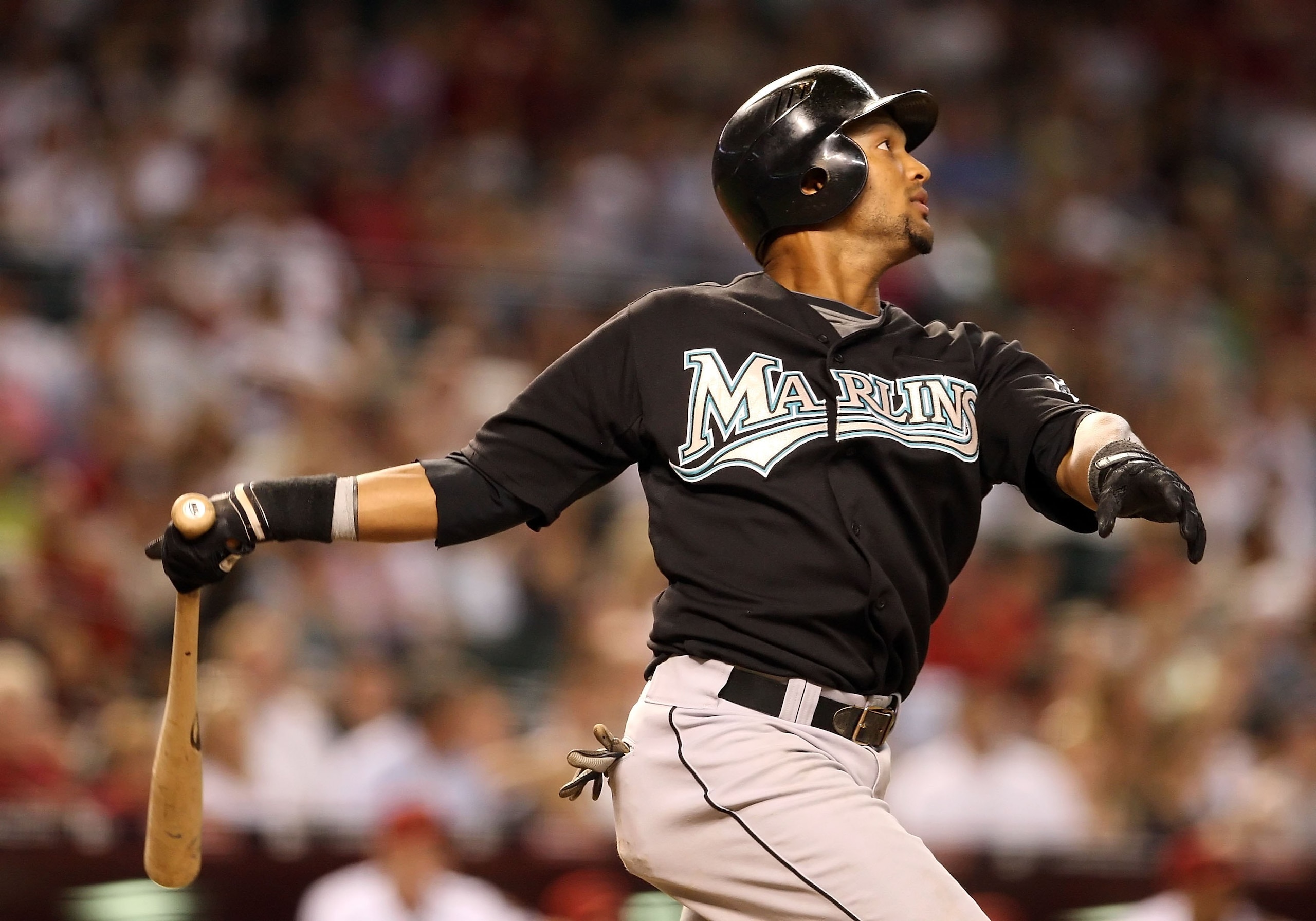 PHOENIX - JULY 10:  Emilio Bonifacio #1 of the Florida Marlins bats against the Arizona Diamondbacks during the major league baseball game at Chase Field on July 10, 2009 in Phoenix, Arizona. The Diamondbacks defeated the Marlins 8-0.  (Photo by Christian