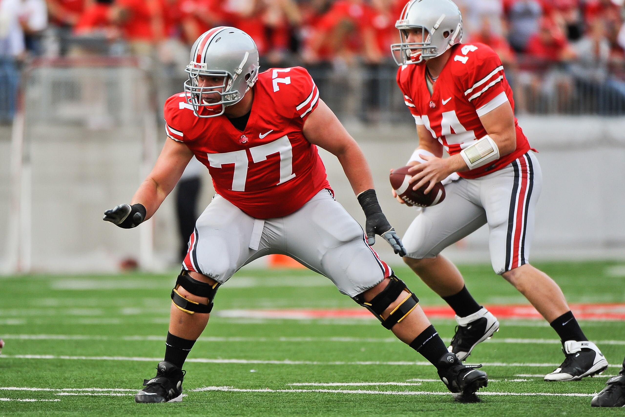 COLUMBUS, OH - SEPTEMBER 25: Connor Smith #77 of the Ohio State Buckeyes blocks against the Eastern Michigan Eagles at Ohio Stadium on September 25, 2010 in Columbus, Ohio. Ohio State won 73-20. (Photo by Jamie Sabau/Getty Images) COLUMBUS, OH - SEPTEMBER 25: Connor Smith #77 of the Ohio State Buckeyes blocks against the Eastern Michigan Eagles at Ohio Stadium on September 25, 2010 in Columbus, Ohio. Ohio State won 73-20. (Photo by Jamie Sabau/Getty Images)