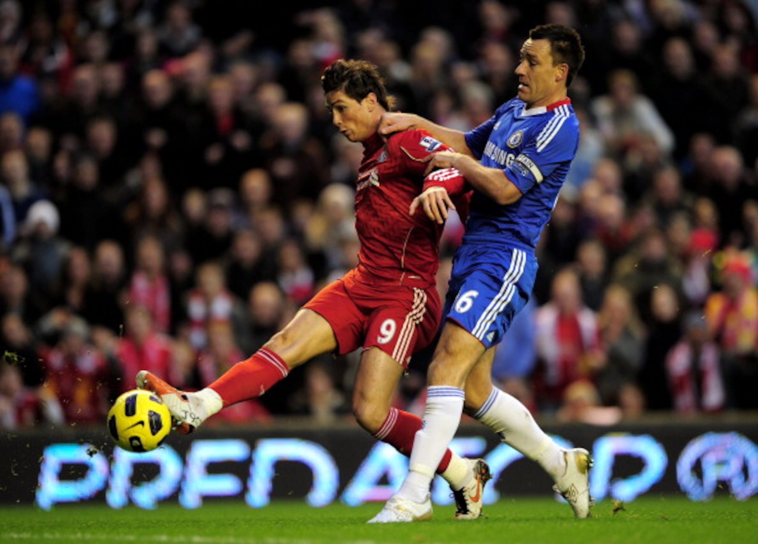 LIVERPOOL, ENGLAND - NOVEMBER 07:  Fernando Torres of Liverpool controls the ball under pressure from John Terry of Chelsea on his way to scoring the opening goal during the Barclays Premier League match between Liverpool and Chelsea at Anfield on Novembe