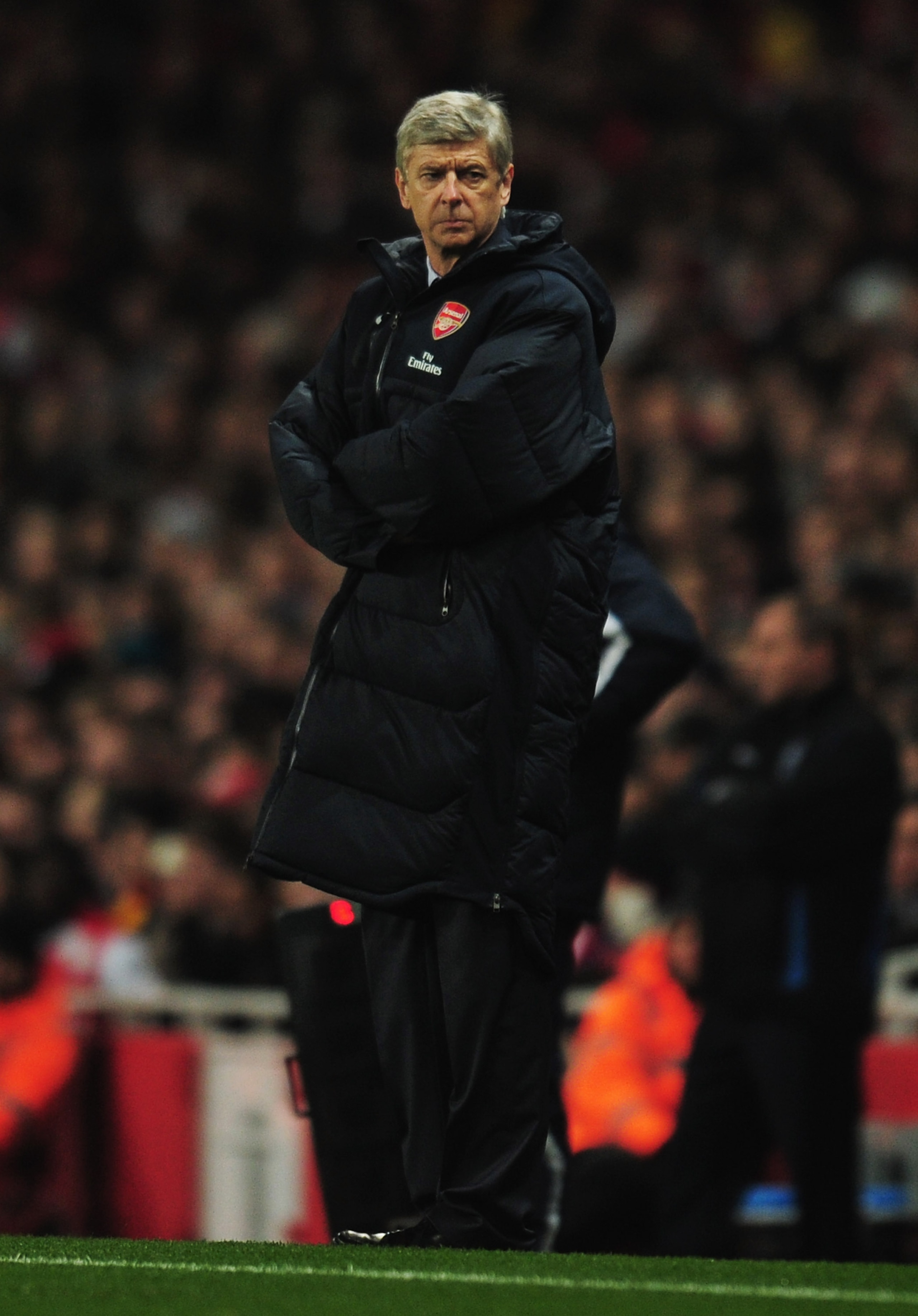 LONDON, ENGLAND - JANUARY 25:  Arsene Wenger manager of Arsenal looks thoughtful during the Carling Cup Semi Final Second Leg match between Arsenal and Ipswich Town at Emirates Stadium on January 25, 2011 in London, England.  (Photo by Shaun Botterill/Get