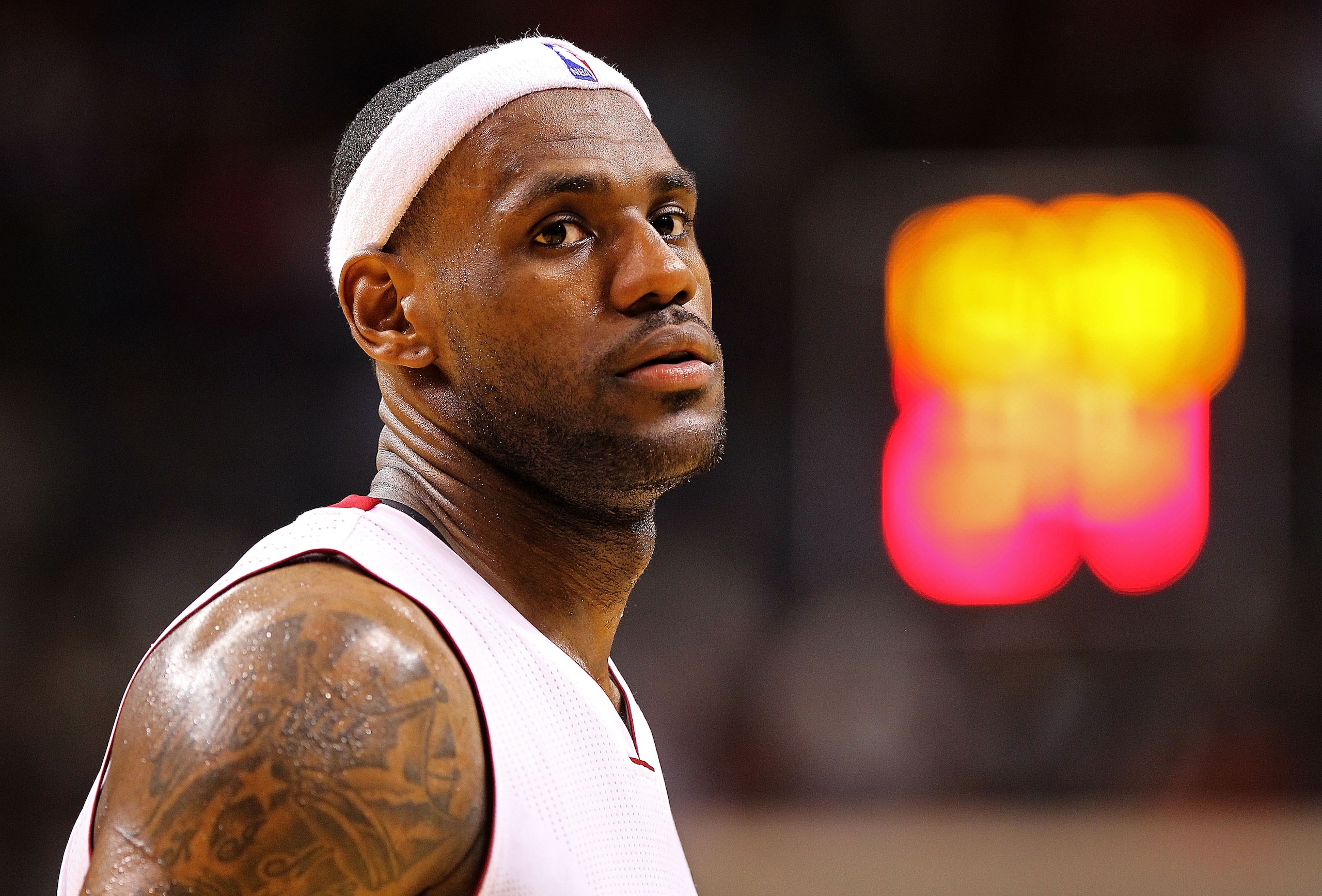 MIAMI, FL - JANUARY 28:  LeBron James #6 of the Miami Heat looks on during a game against the Detroit Pistons at American Airlines Arena on January 28, 2011 in Miami, Florida. NOTE TO USER: User expressly acknowledges and agrees that, by downloading and/o