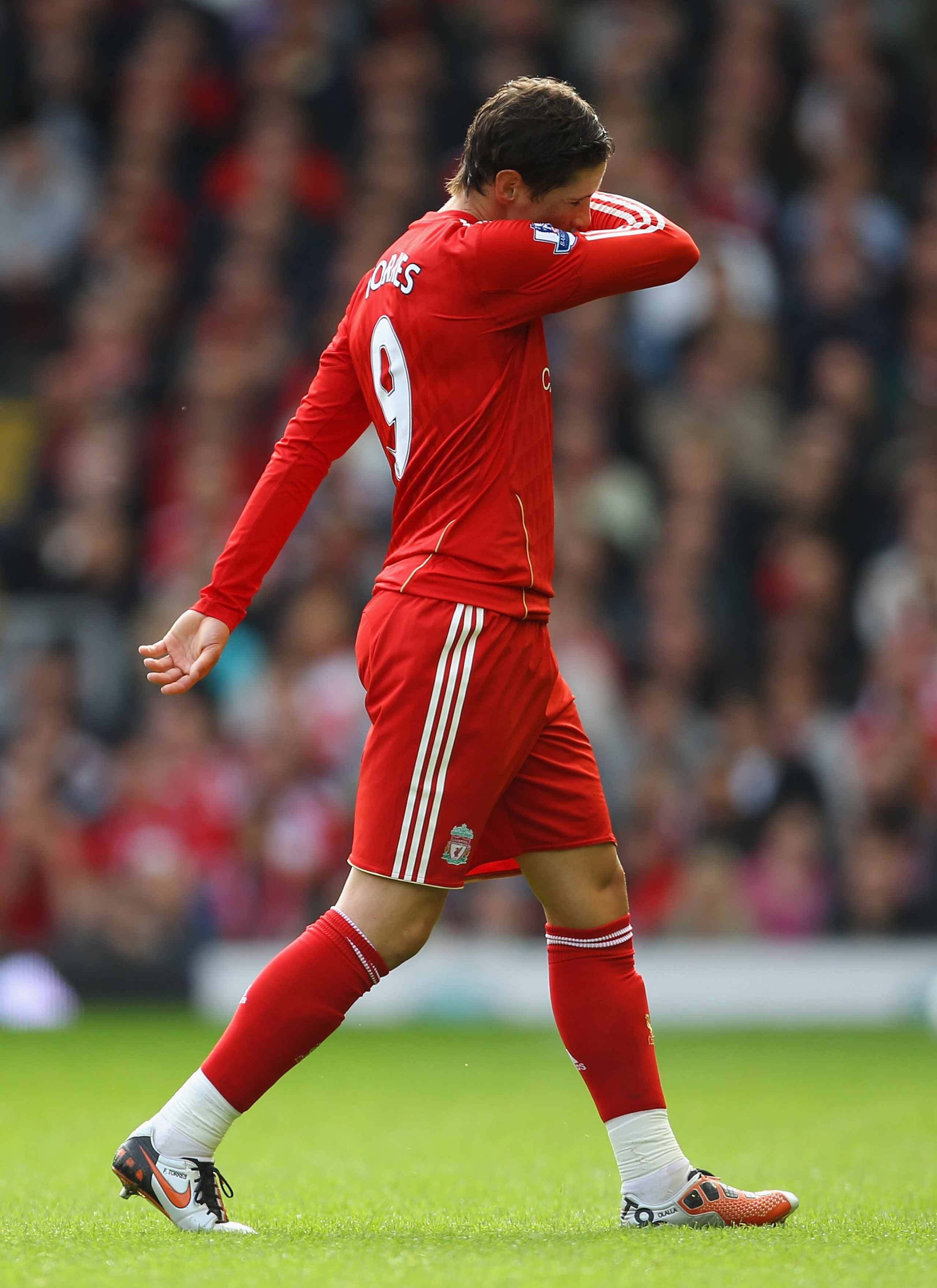 LIVERPOOL, ENGLAND - OCTOBER 03: Fernando Torres of Liverpool looks dejected as he walks off the pitch following his substitution during the Barclays Premier League match between Liverpool and Blackpool at Anfield on October 3, 2010 in Liverpool, England LIVERPOOL, ENGLAND - OCTOBER 03: Fernando Torres of Liverpool looks dejected as he walks off the pitch following his substitution during the Barclays Premier League match between Liverpool and Blackpool at Anfield on October 3, 2010 in Liverpool, England