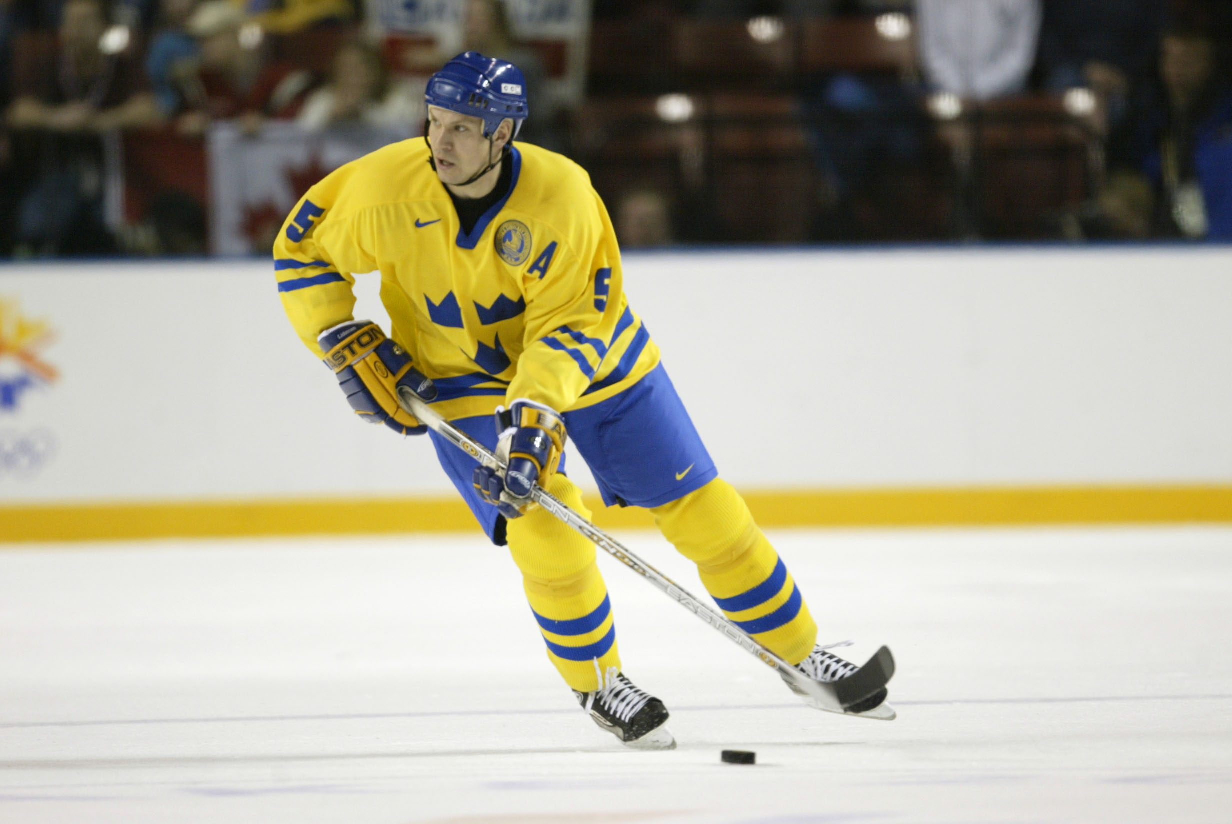 15 Feb 2002:    As he skates down the ice, Nicklas Lidstrom #5 of Sweden looks to pass the puck during the Salt Lake City Winter Olympic Games at the E Center in Salt Lake City, Utah. DIGITAL IMAGE. Mandatory Credit:   Brian Bahr/Getty Images