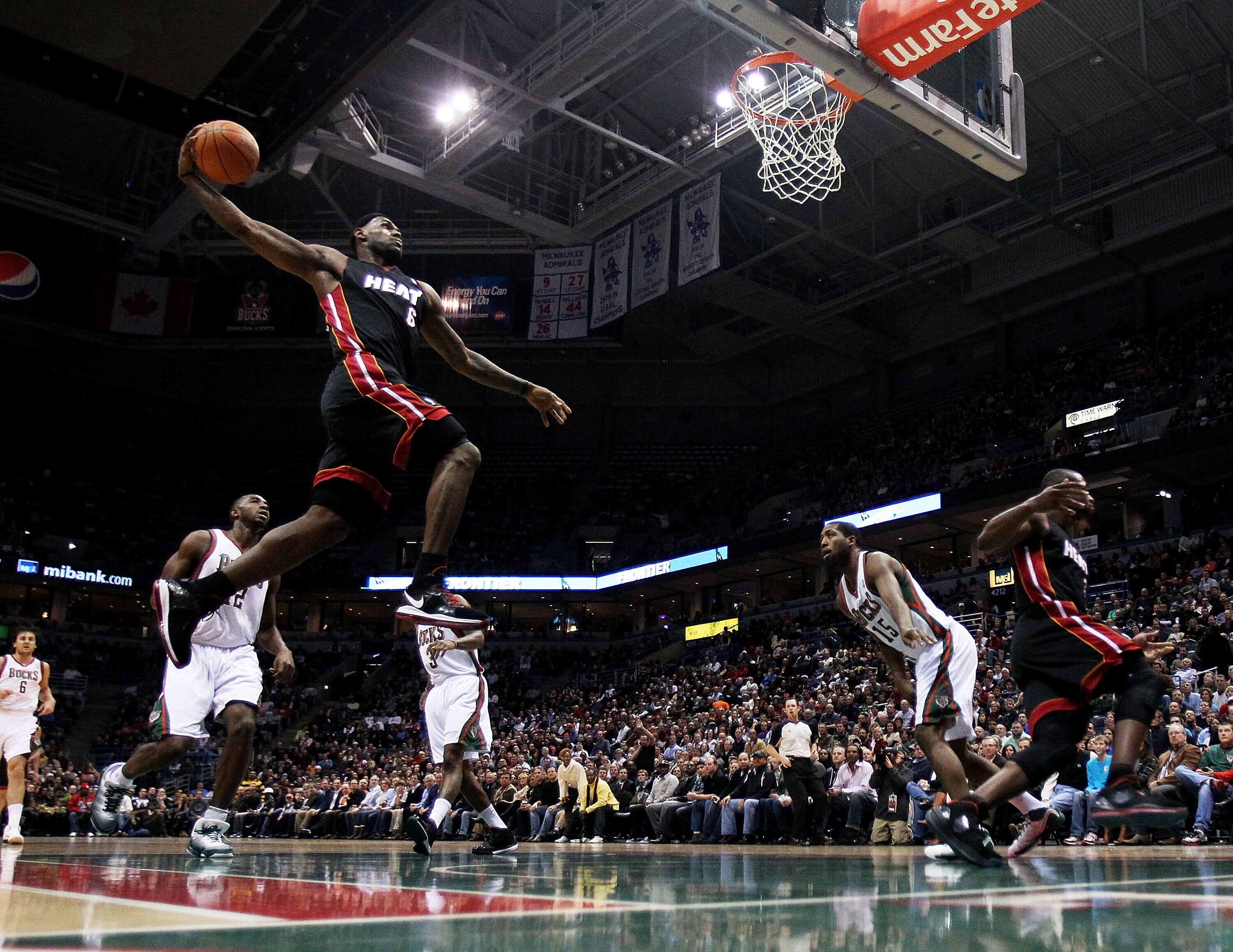 MILWAUKEE, WI - DECEMBER 06: LeBron James #6 of the Miami Heat goes up for a dunk against the Milwaukee Bucks at the Bradley Center on December 6, 2010 in Milwaukee, Wisconsin. NOTE TO USER: User expressly acknowledges and agrees that, by downloading and/