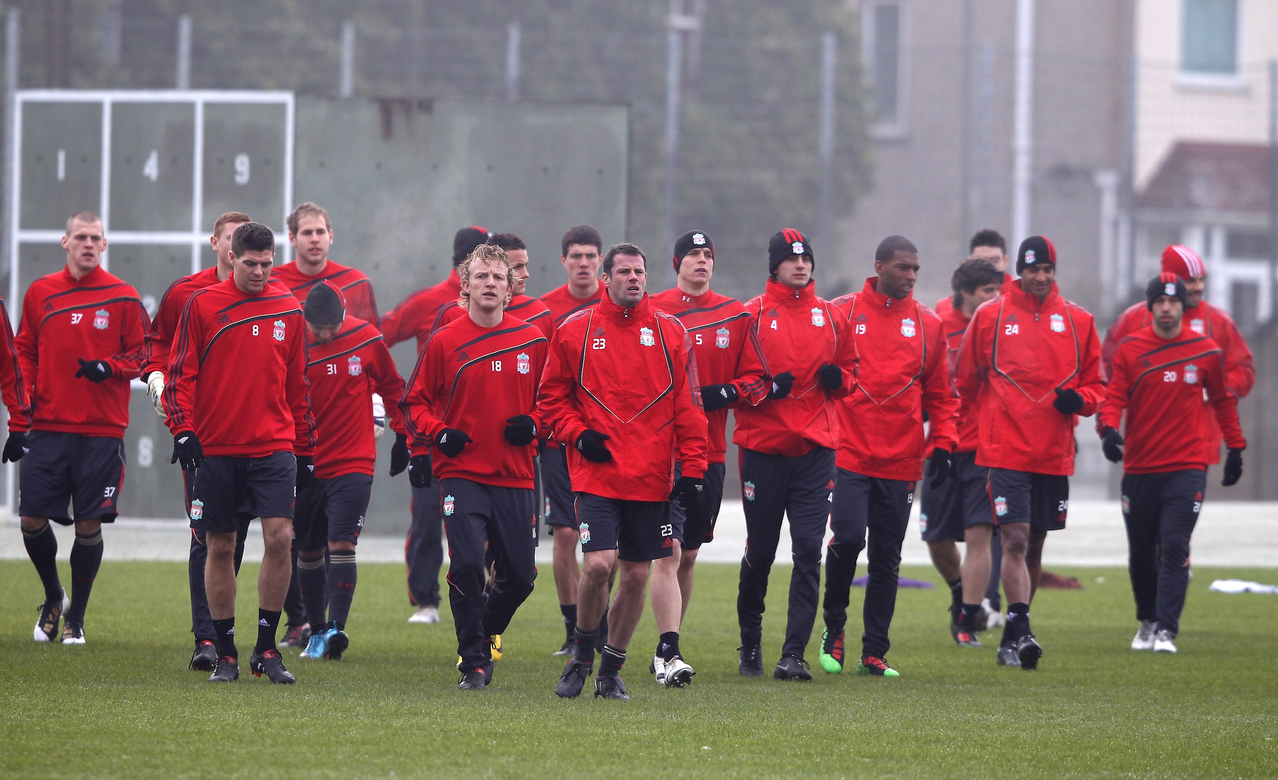 LIVERPOOL, ENGLAND - FEBRUARY 17: The Liverpool squad warm up during a training session prior to the UEFA Europa League round of 32 first-leg match between Liverpool and Unirea Urziceni at Melwood training ground on February 17, 2010 in Liverpool, Englan LIVERPOOL, ENGLAND - FEBRUARY 17: The Liverpool squad warm up during a training session prior to the UEFA Europa League round of 32 first-leg match between Liverpool and Unirea Urziceni at Melwood training ground on February 17, 2010 in Liverpool, Englan