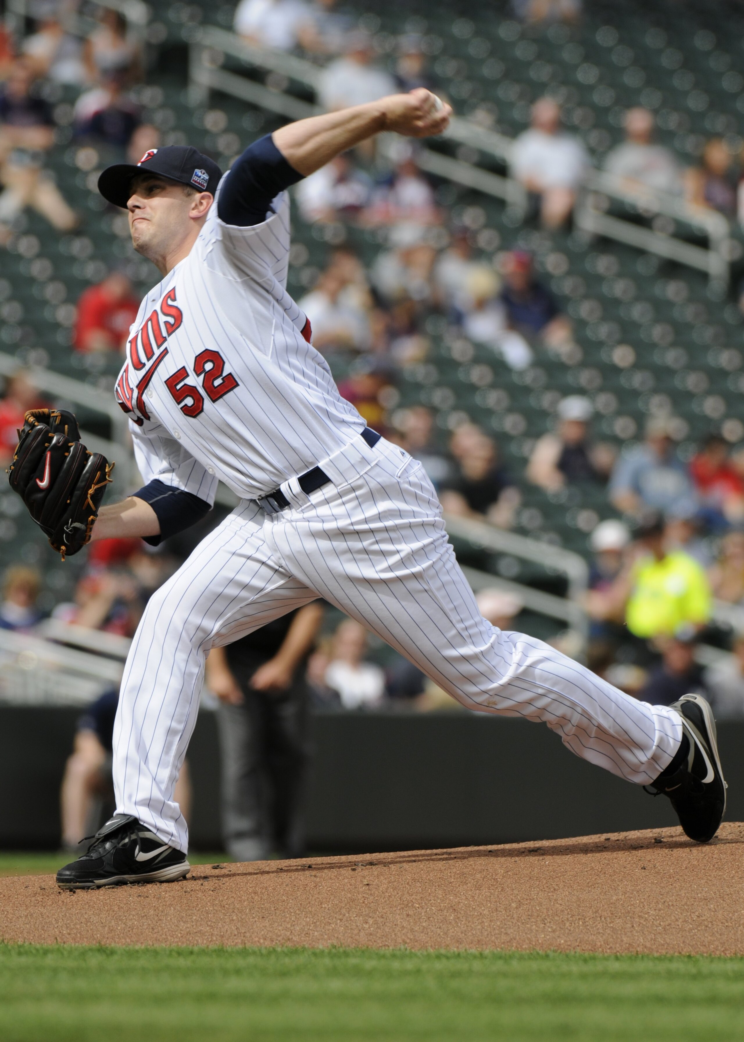 MINNEAPOLIS, MN - MAY 26: Brian Duensing #52 of the Minnesota Twins pitches in the sixth inning against the New York Yankees during the game on May 26, 2010 at Target Field in Minneapolis, Minnesota. The game was suspended due to rain after the fifth inni