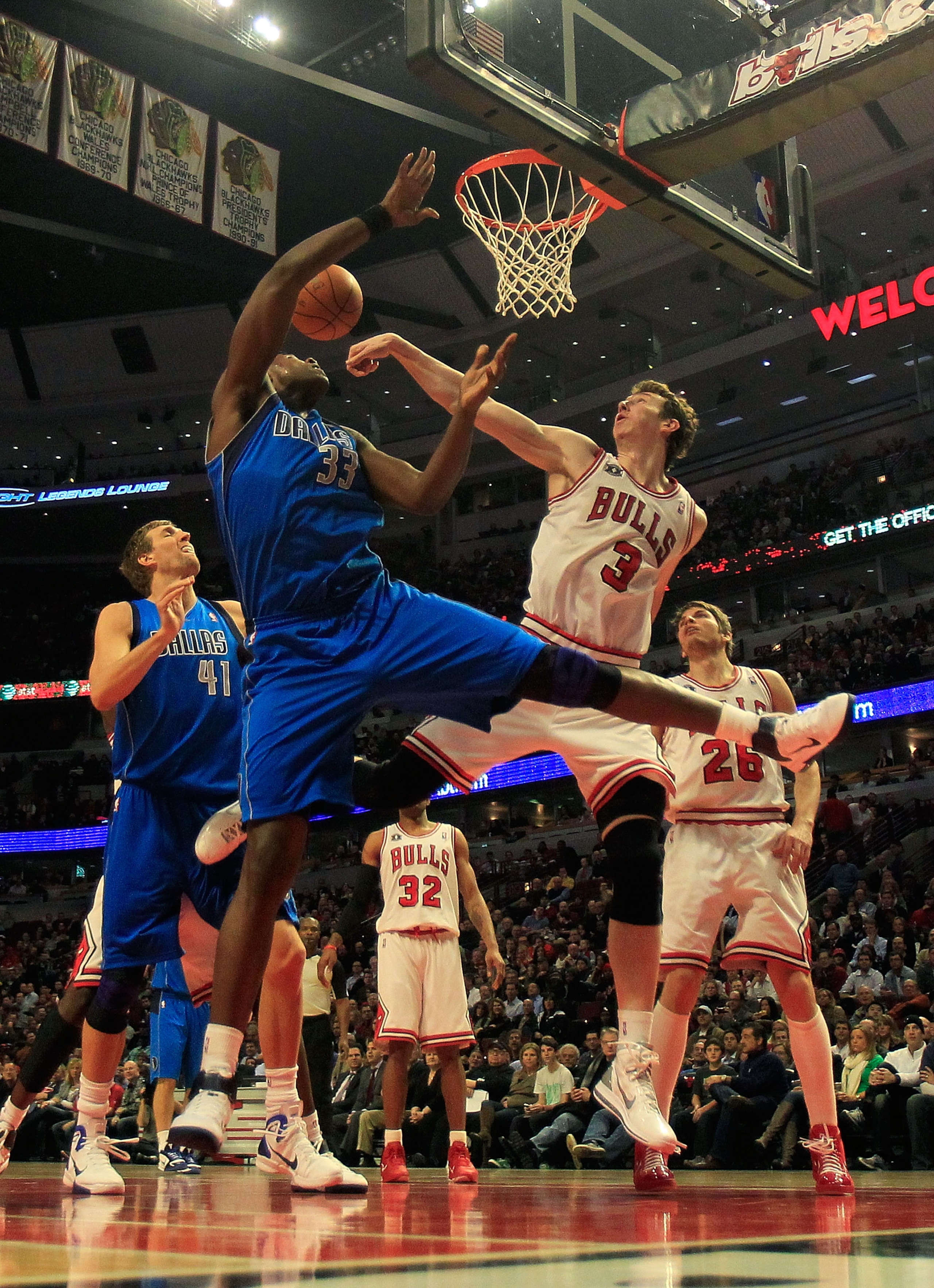 CHICAGO, IL - JANUARY 20: Omer Asik #3 of the Chicago Bulls blocks a shot by Brendan Haywood #33 of the Dallas Mavericks at the United Center on January 20, 2011 in Chicago, Illinois. The Bulls defeated the Mavericks 82-77. NOTE TO USER: User expressly ac