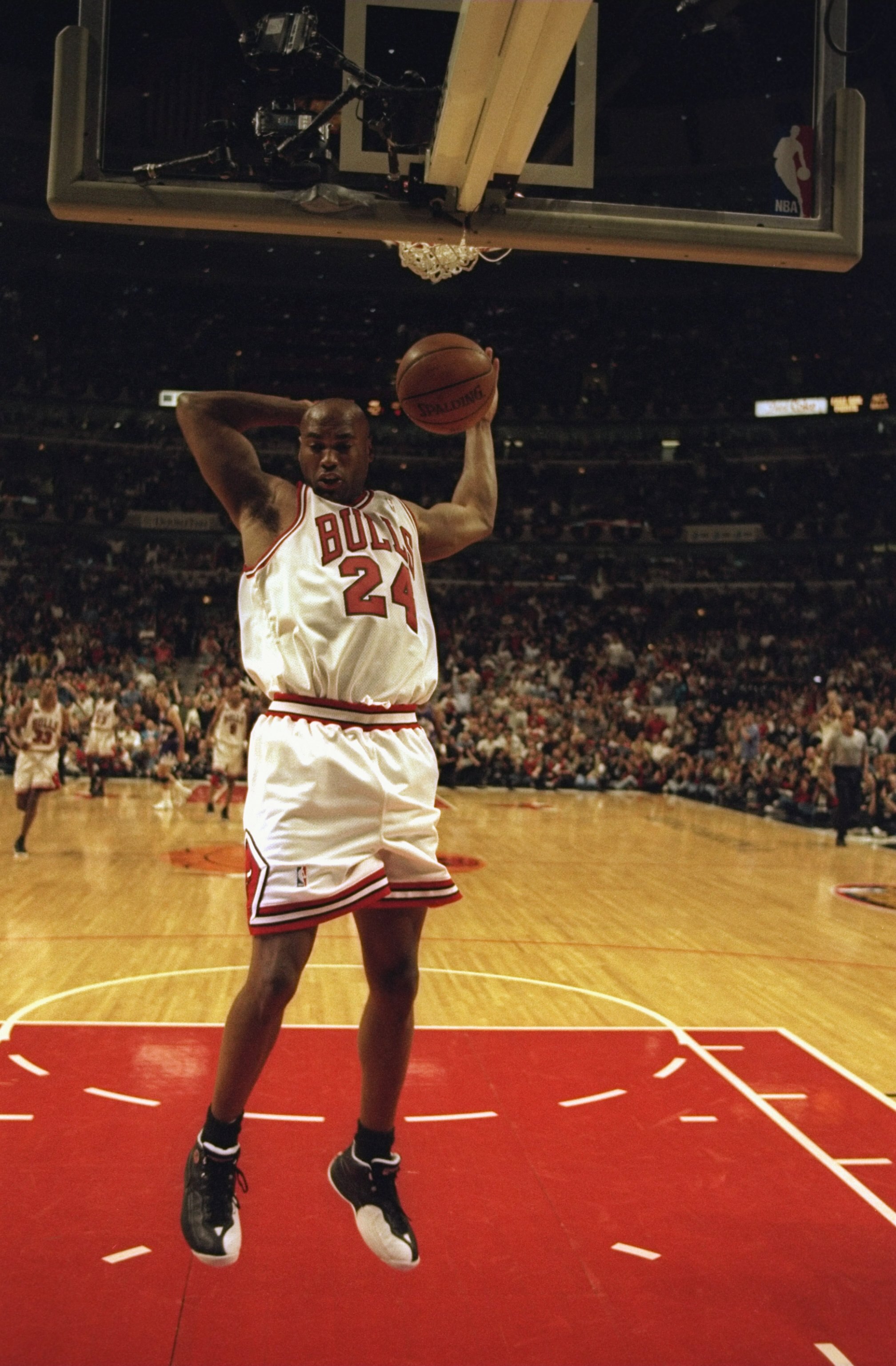 7 Jun 1998:  Scott Burrell #24 of the Chicago Bulls makes a dunk on a fast break during the NBA Finals game 3 against the Utah Jazz at the United Center in Chicago, Illinois.  The Bulls defeated the Jazz 96-54. Mandatory Credit: Jonathan Daniel  /Allsport