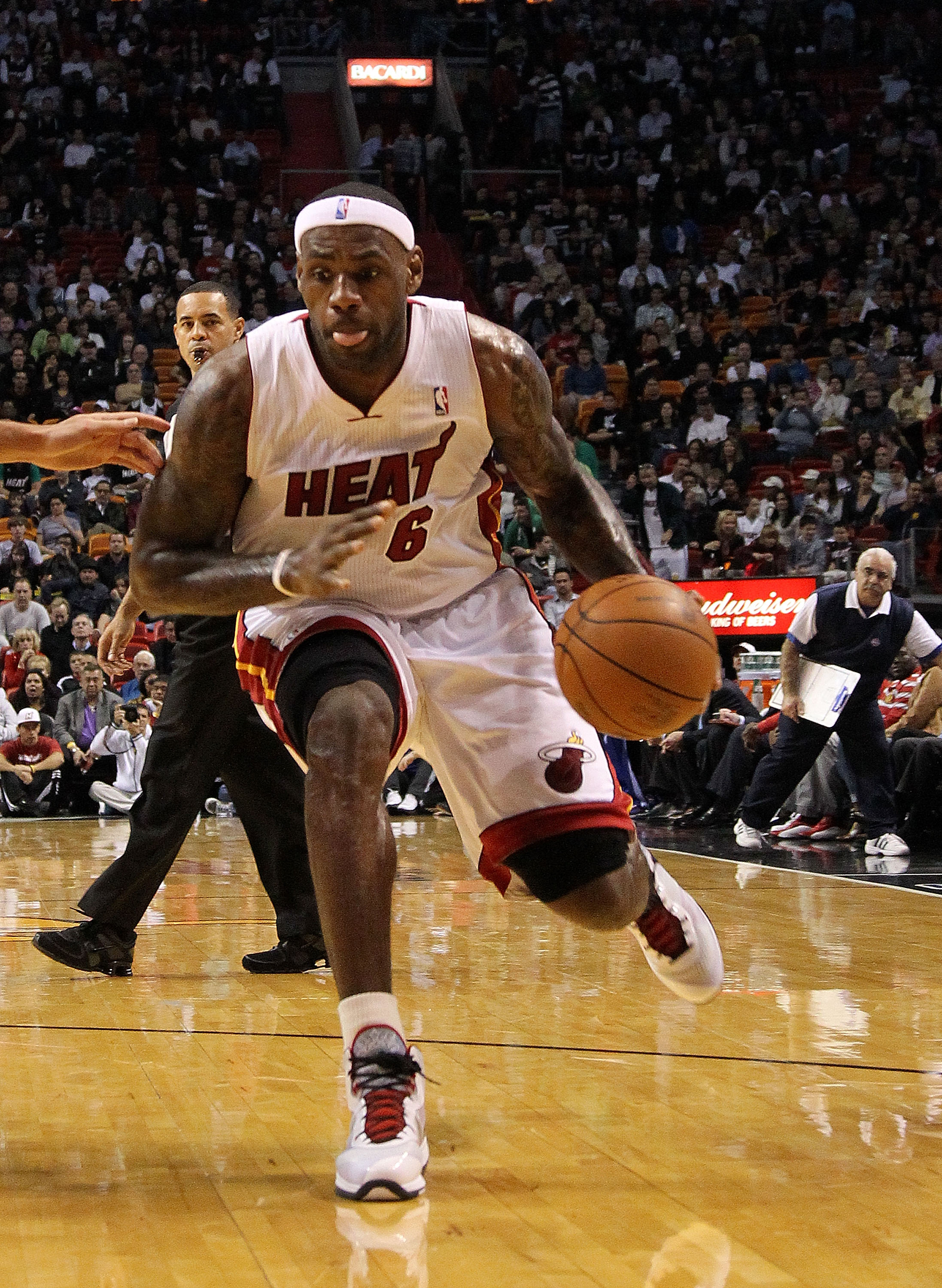 MIAMI, FL - JANUARY 28:  LeBron James #6 of the Miami Heat drives to the basket during a game against the Detroit Pistons at American Airlines Arena on January 28, 2011 in Miami, Florida. NOTE TO USER: User expressly acknowledges and agrees that, by downl