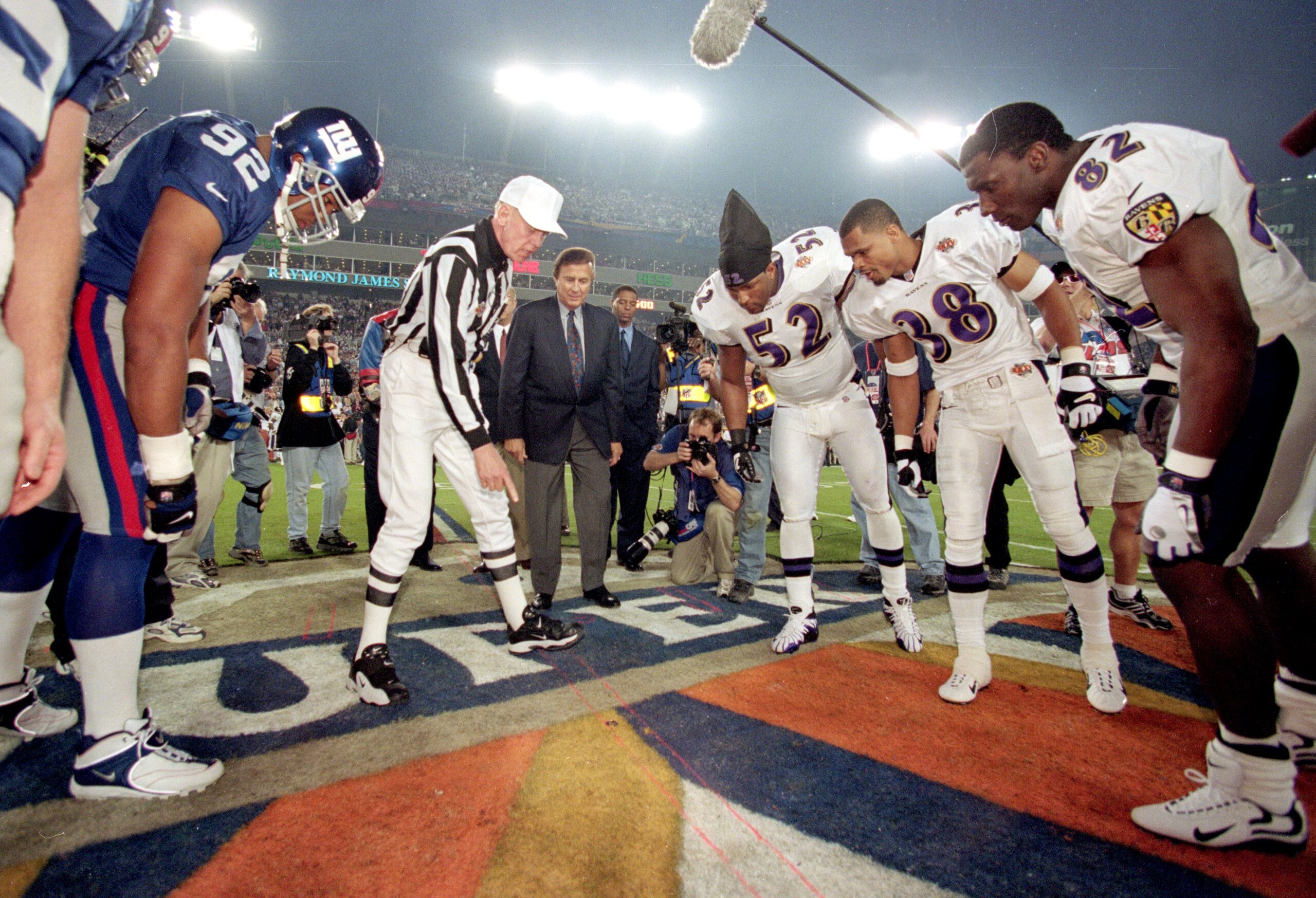28 Jan 2001:  A view of the coin toss taken before Super Bowl XXXV between the New York Giants and the Baltimore Ravens at the Raymond James Stadium in Tampa, Florida. The Ravens defeated the Giants 34-7.Mandatory Credit: Andy Lyons  /Allsport