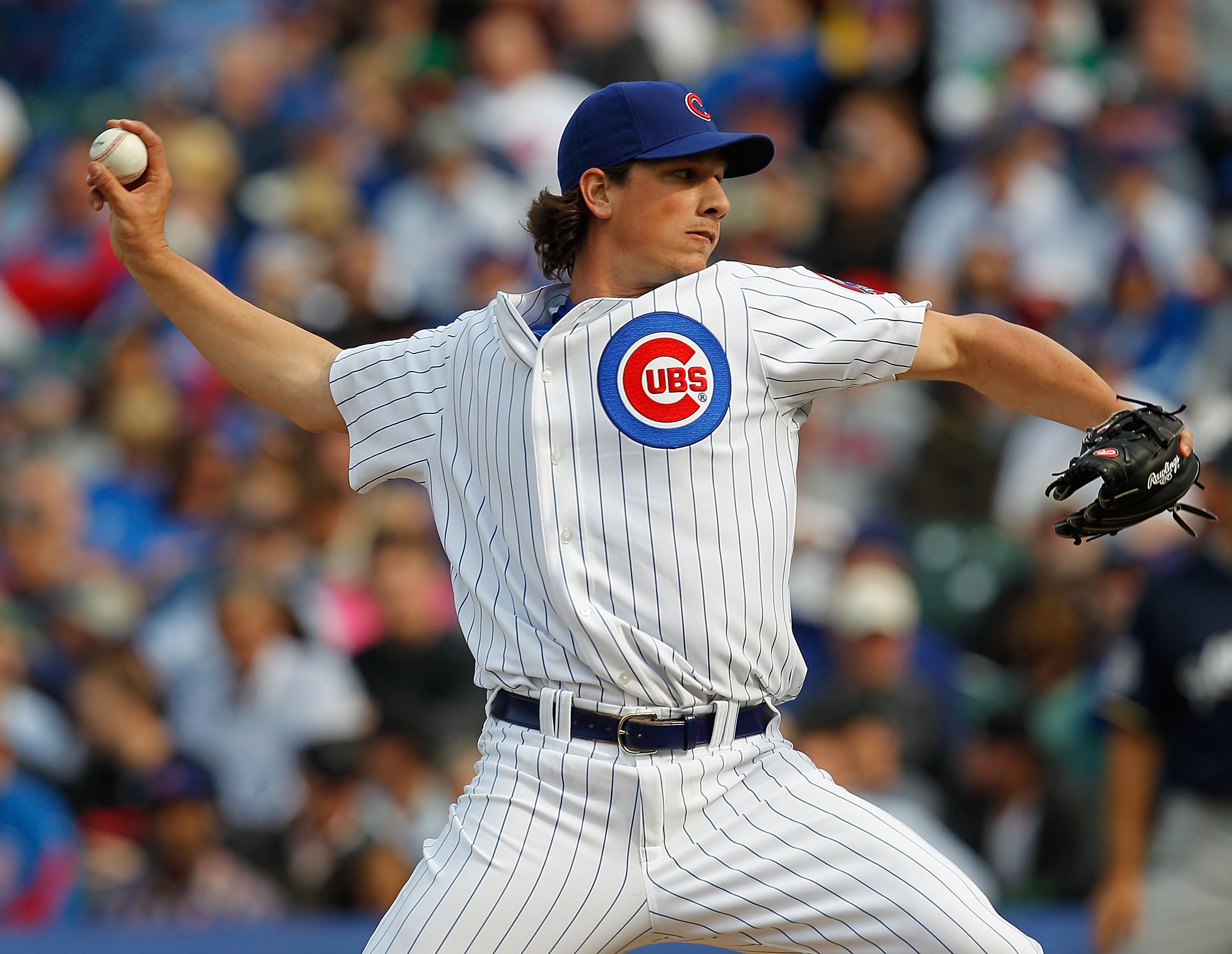 CHICAGO - APRIL 12: Jeff Samardzija #29 of the Chicago Cubs pitches against the Milwaukee Brewers on Opening Day at Wrigley Field on April 12, 2010 in Chicago, Illinois. The Cubs defeated the Brewers 9-5.  (Photo by Jonathan Daniel/Getty Images)