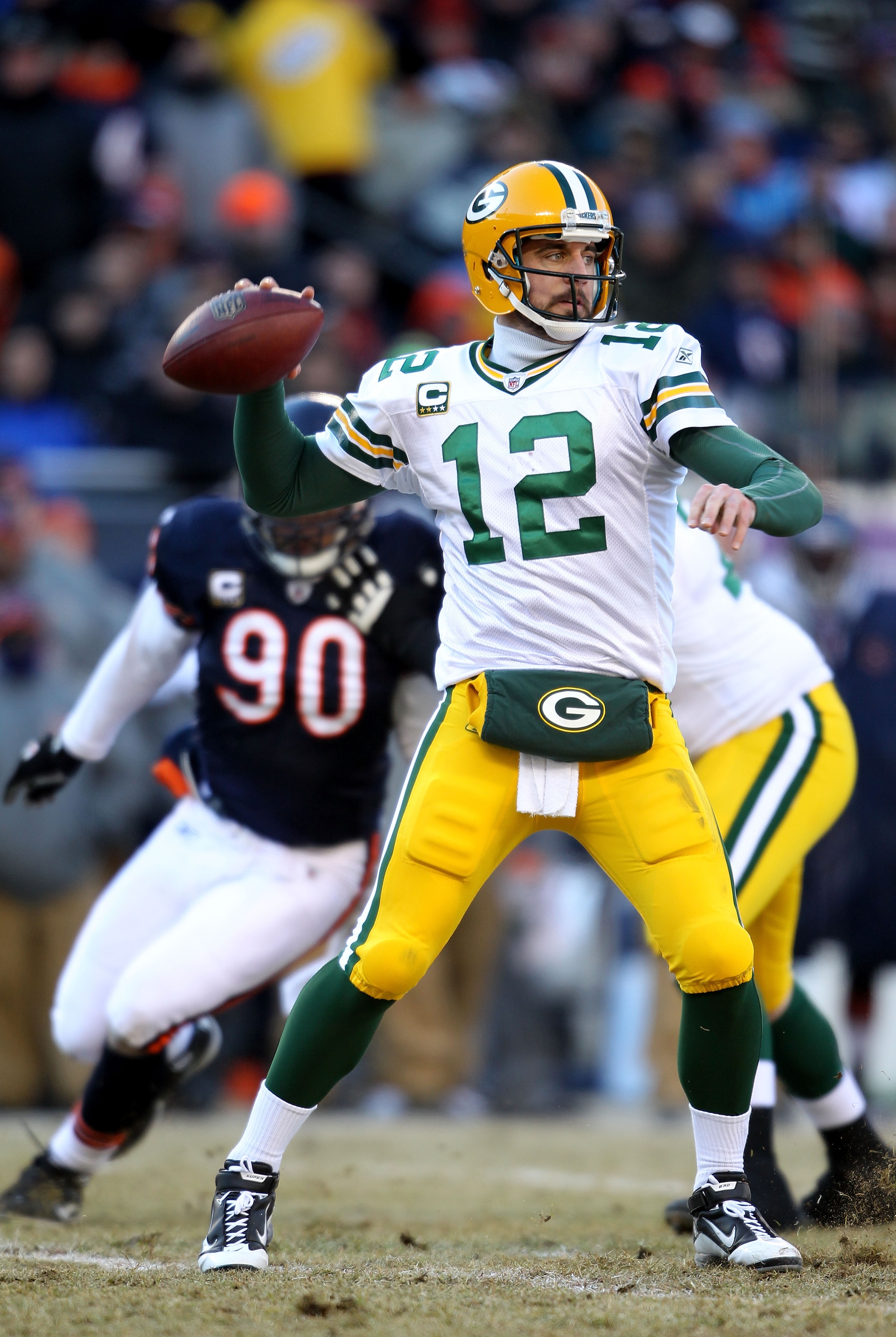 CHICAGO, IL - JANUARY 23: Quarterback Aaron Rodgers #12 of the Green Bay Packers looks to pass against the Chicago Bears in the NFC Championship Game at Soldier Field on January 23, 2011 in Chicago, Illinois. (Photo by Andy Lyons/Getty Images) CHICAGO, IL - JANUARY 23: Quarterback Aaron Rodgers #12 of the Green Bay Packers looks to pass against the Chicago Bears in the NFC Championship Game at Soldier Field on January 23, 2011 in Chicago, Illinois. (Photo by Andy Lyons/Getty Images)