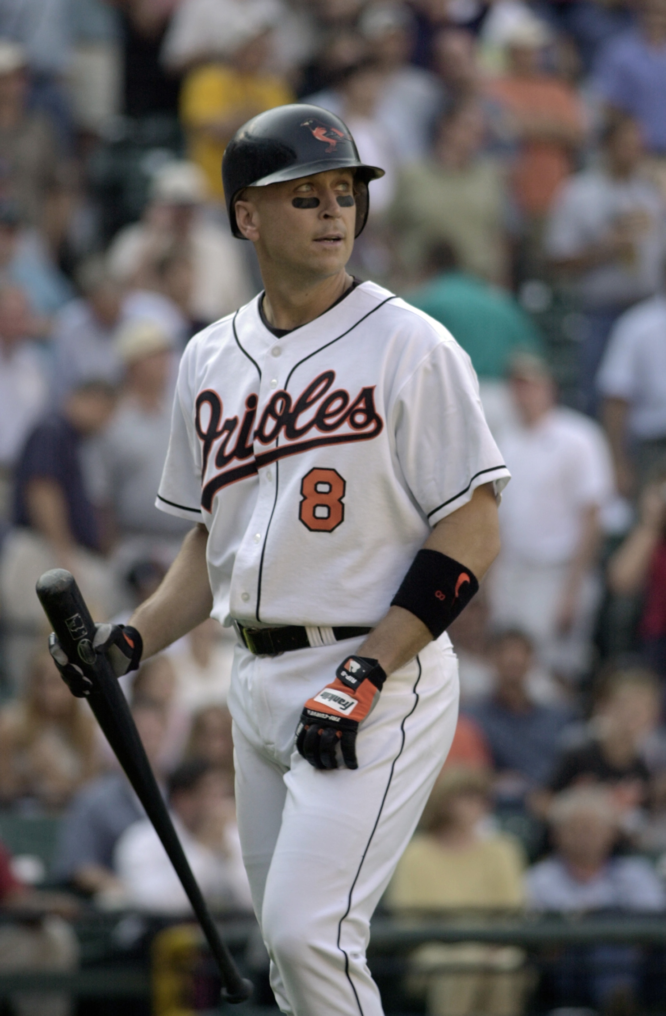 BALTIMORE - OCTOBER 5:  Shortstop Cal Ripken Jr. #8 of the Baltimore Orioles walks with his bat during the MLB game against the Boston Red Sox on October 5, 2001 at Oriole Park at Camden Yards in Baltimore, Maryland.  The Red Sox won 5-0.  (Photo by: Doug