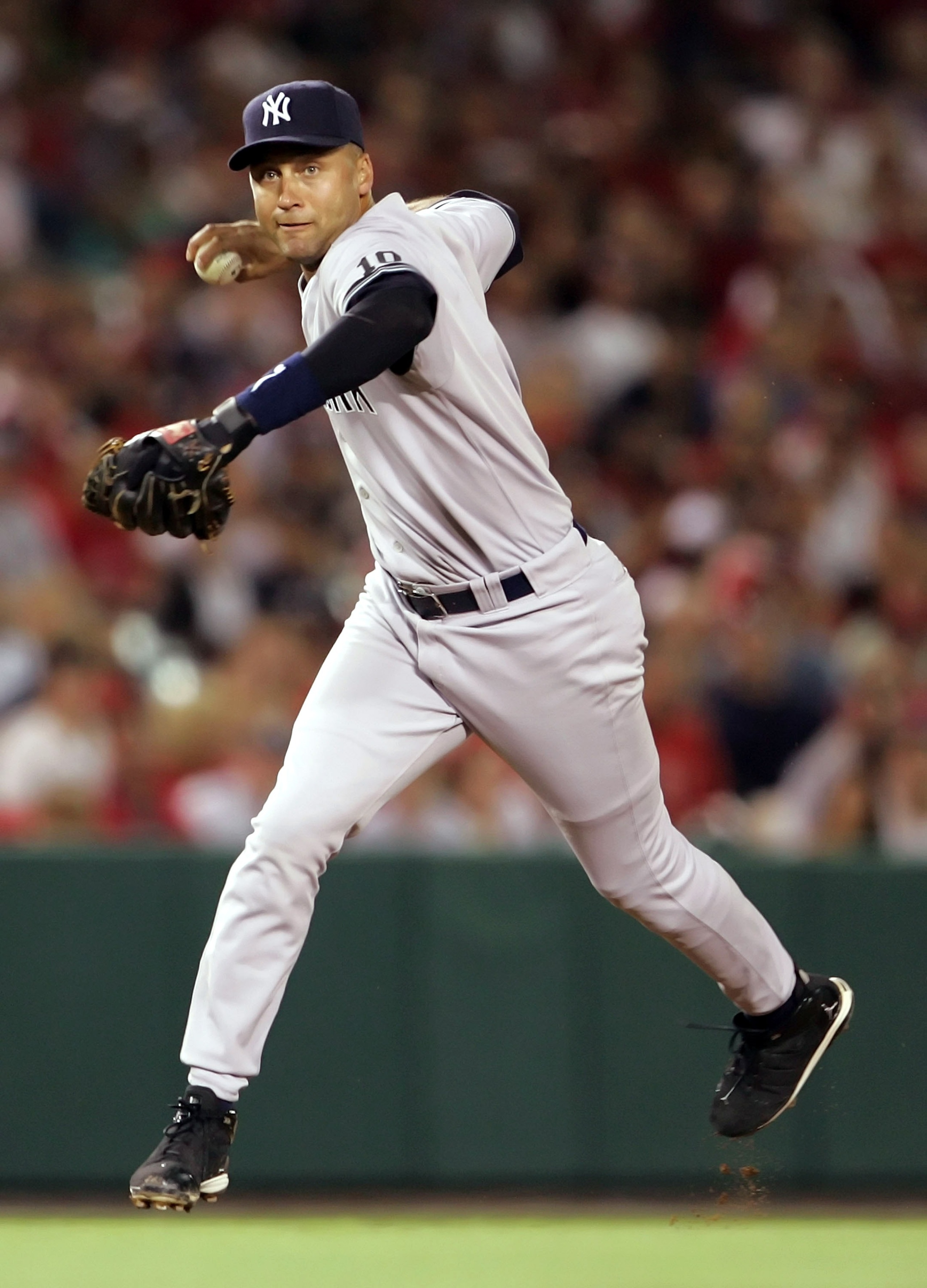 ANAHEIM, CA - AUGUST 20:  Shortstop Derek Jeter #2 of the New York Yankees fields a ground ball in the third inning against the Los Angeles Angels of Anaheim at Angel Stadium on August 20, 2007 in Anaheim, California.  (Photo by Jeff Gross/Getty Images)