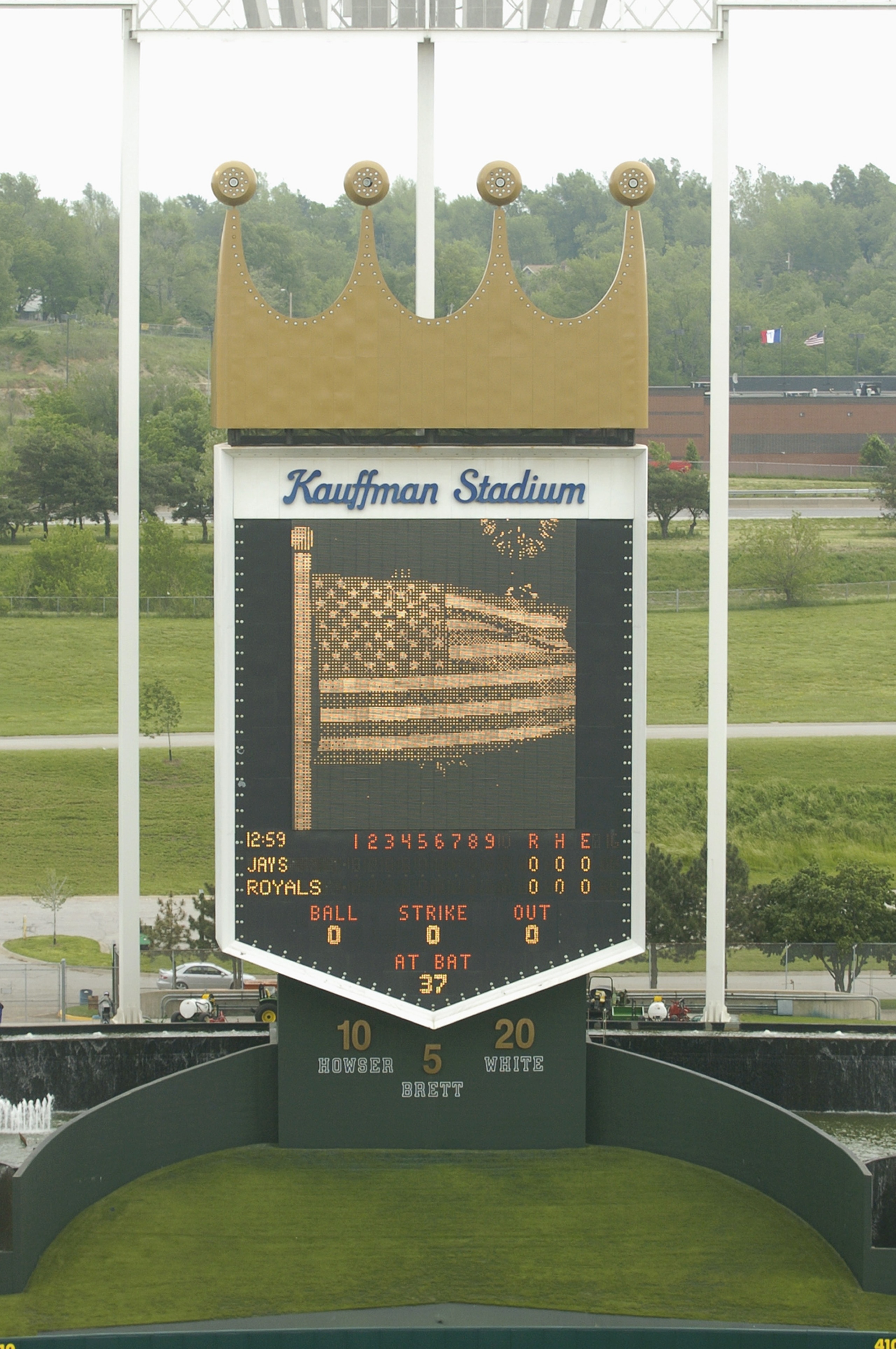 KANSAS CITY, MO - MAY 12:  The Kauffman Stadium scoreboard displays the American Flag prior to the game between the Kansas City Royals and the Toronto Blue Jays on May 12, 2004 in Kansas City, Missouri.  The Royals won 4-3.  (Photo by Larry W. Smith/Getty