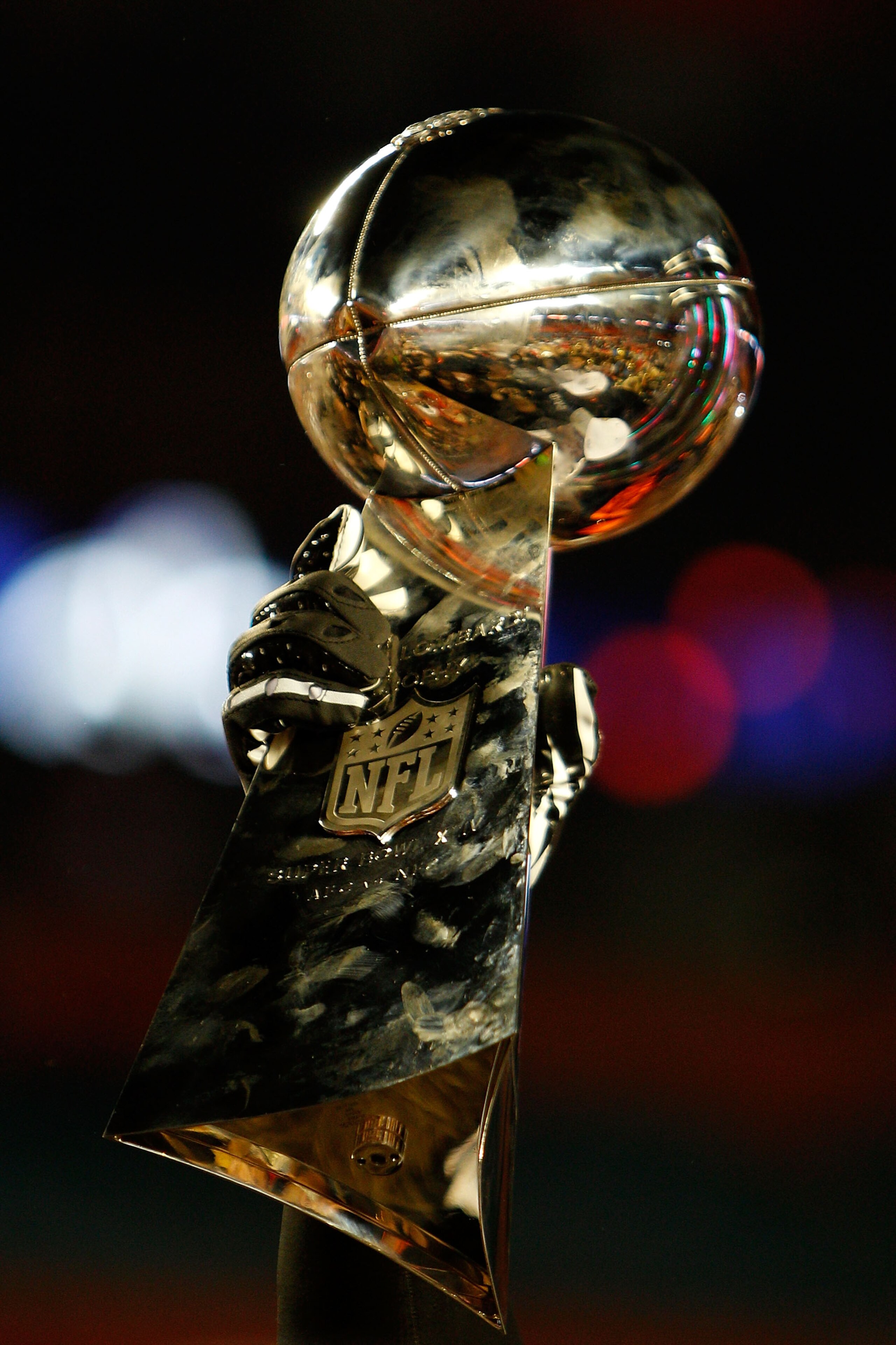 MIAMI GARDENS, FL - FEBRUARY 07:  A detail of the Vince Lombardi Trophy as the New Orleans Saints celebrate after defeating the Indianapolis Colts during Super Bowl XLIV on February 7, 2010 at Sun Life Stadium in Miami Gardens, Florida.  (Photo by Chris G
