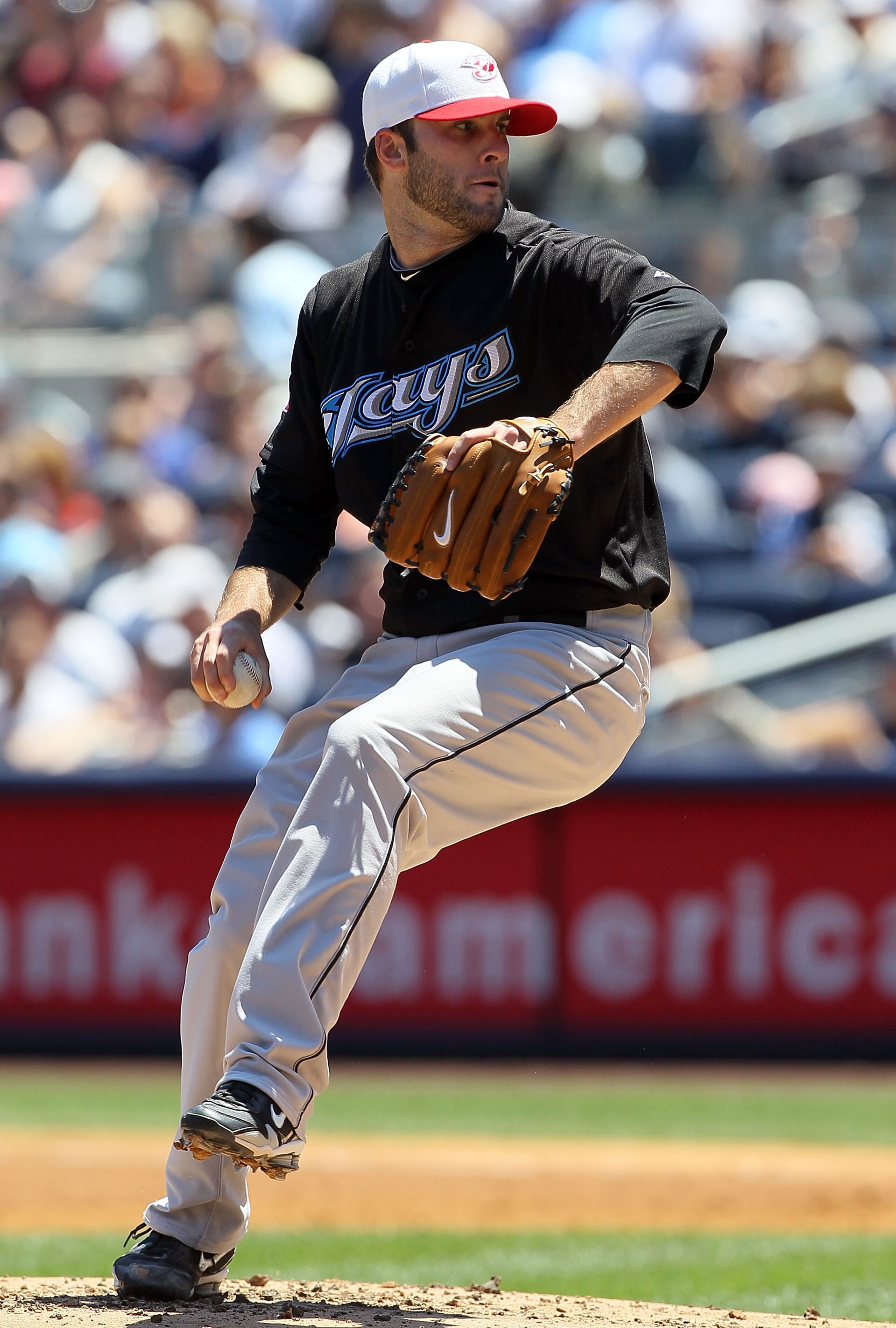 NEW YORK - JULY 04: Brandon Morrow #23 of the Toronto Blue Jays delivers a pitch against the New York Yankees on July 4, 2010 at Yankee Stadium in the Bronx borough of New York City. (Photo by Jim McIsaac/Getty Images) NEW YORK - JULY 04: Brandon Morrow #23 of the Toronto Blue Jays delivers a pitch against the New York Yankees on July 4, 2010 at Yankee Stadium in the Bronx borough of New York City. (Photo by Jim McIsaac/Getty Images)