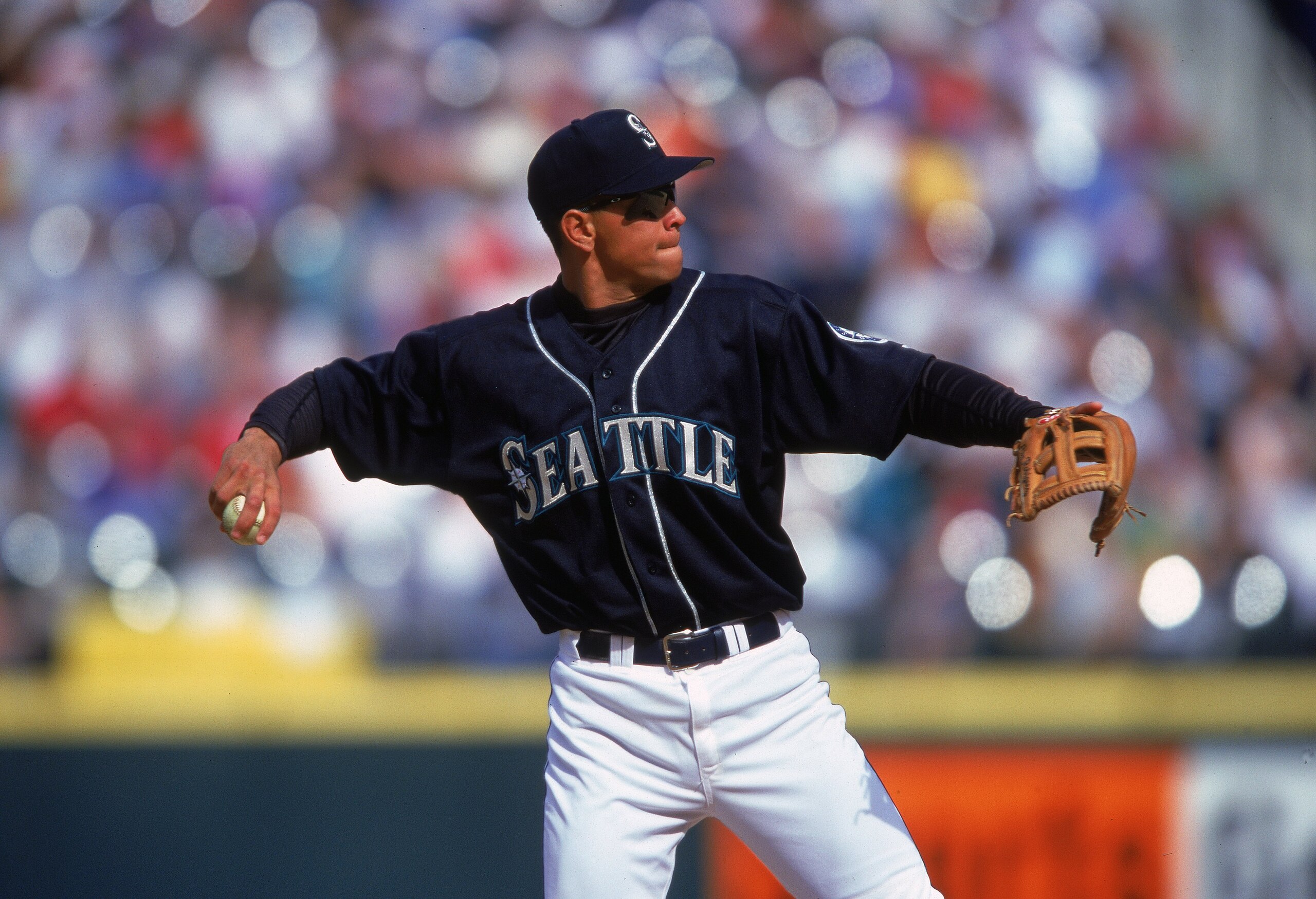 8 Apr 2000:  Alex Rodriguez #3 of the Seattle Mariners throwing the ball during the game against the New York Yankees at Safeco Field in Seattle, Washington. The Yankees defeated the Mariners 3-2. Mandatory Credit: Otto Greule Jr.  /Allsport