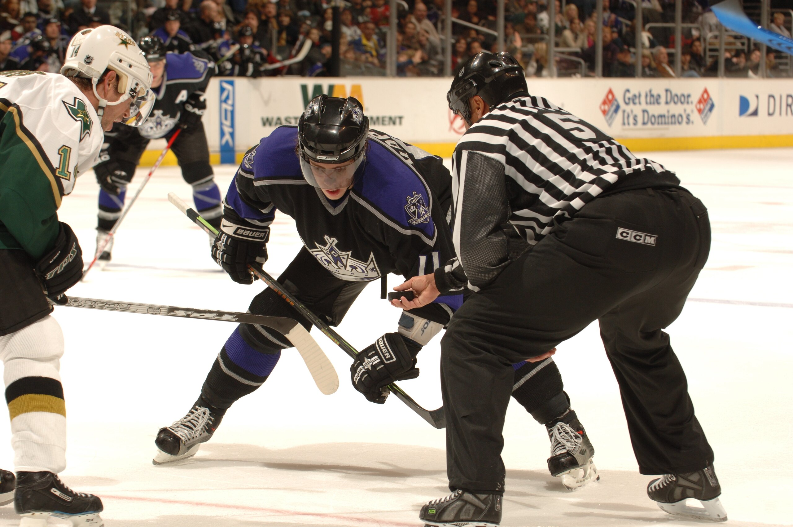 LOS ANGELES - DECEMBER 16: Stu Barnes #14 of the Dallas Stars faces off against Anze Kopitar #11 of the Los Angeles Kings at Staples Center on December 16, 2006 in Los Angeles, California. The Stars won 4-3 in a shootout. (Photo by Noah Graham/Getty Imag LOS ANGELES - DECEMBER 16: Stu Barnes #14 of the Dallas Stars faces off against Anze Kopitar #11 of the Los Angeles Kings at Staples Center on December 16, 2006 in Los Angeles, California. The Stars won 4-3 in a shootout. (Photo by Noah Graham/Getty Imag