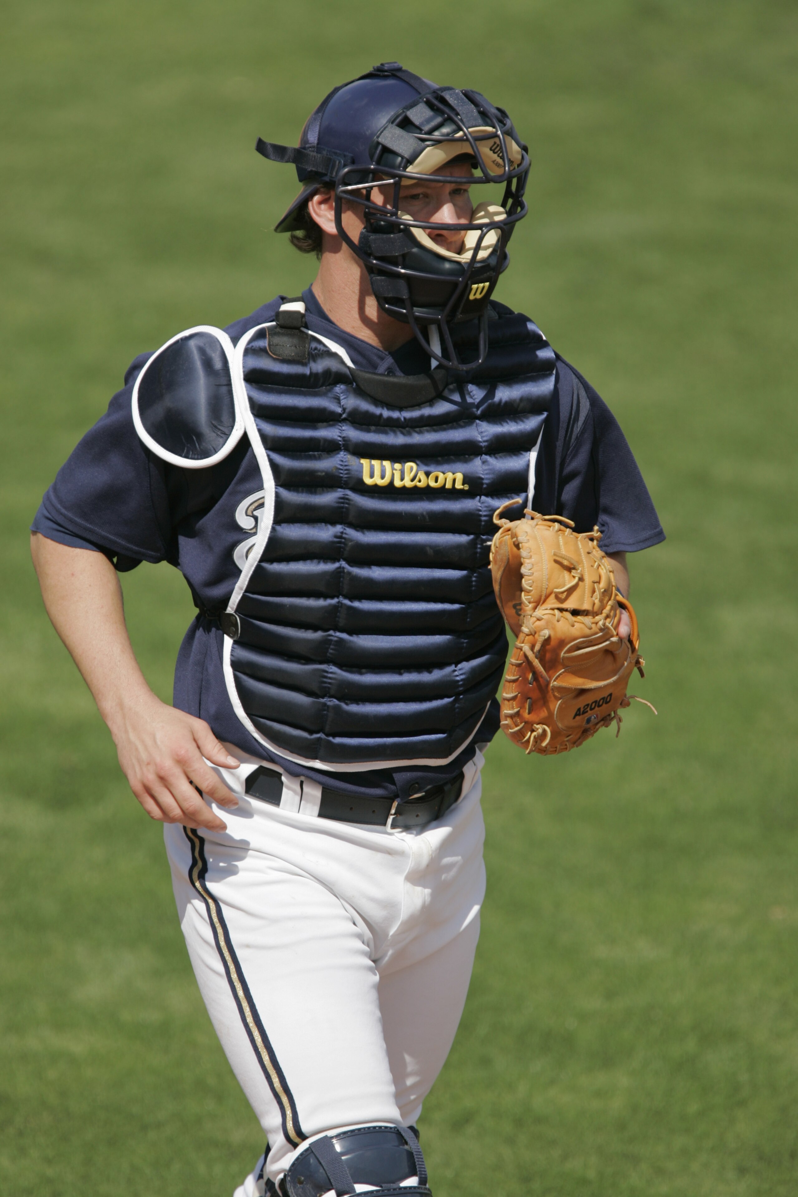 PHOENIX, AZ - MARCH 4:  Catcher Damian Miller #26 of the Milwaukee Brewers jogs during the spring training game against the Seattle Mariners on March 4, 2005 at Maryvale Baseball Park in Phoenix, Arizona.  the Brewers won 8-1.  (Photo by Brian Bahr/Getty