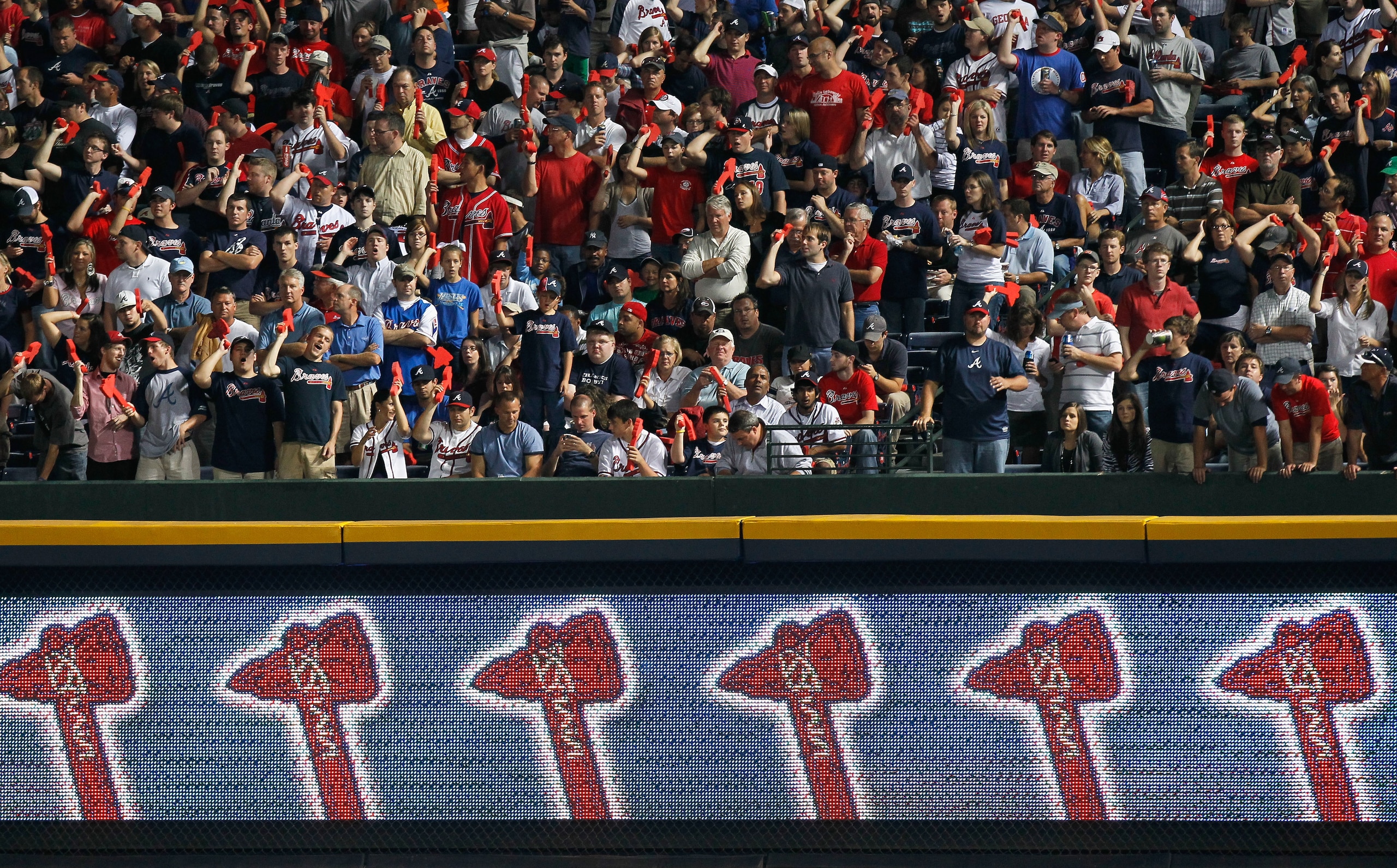 ATLANTA - OCTOBER 11:  Fans of the Atlanta Braves cheer against the San Francisco Giants during Game Four of the NLDS of the 2010 MLB Playoffs at Turner Field on October 11, 2010 in Atlanta, Georgia.  (Photo by Kevin C. Cox/Getty Images)