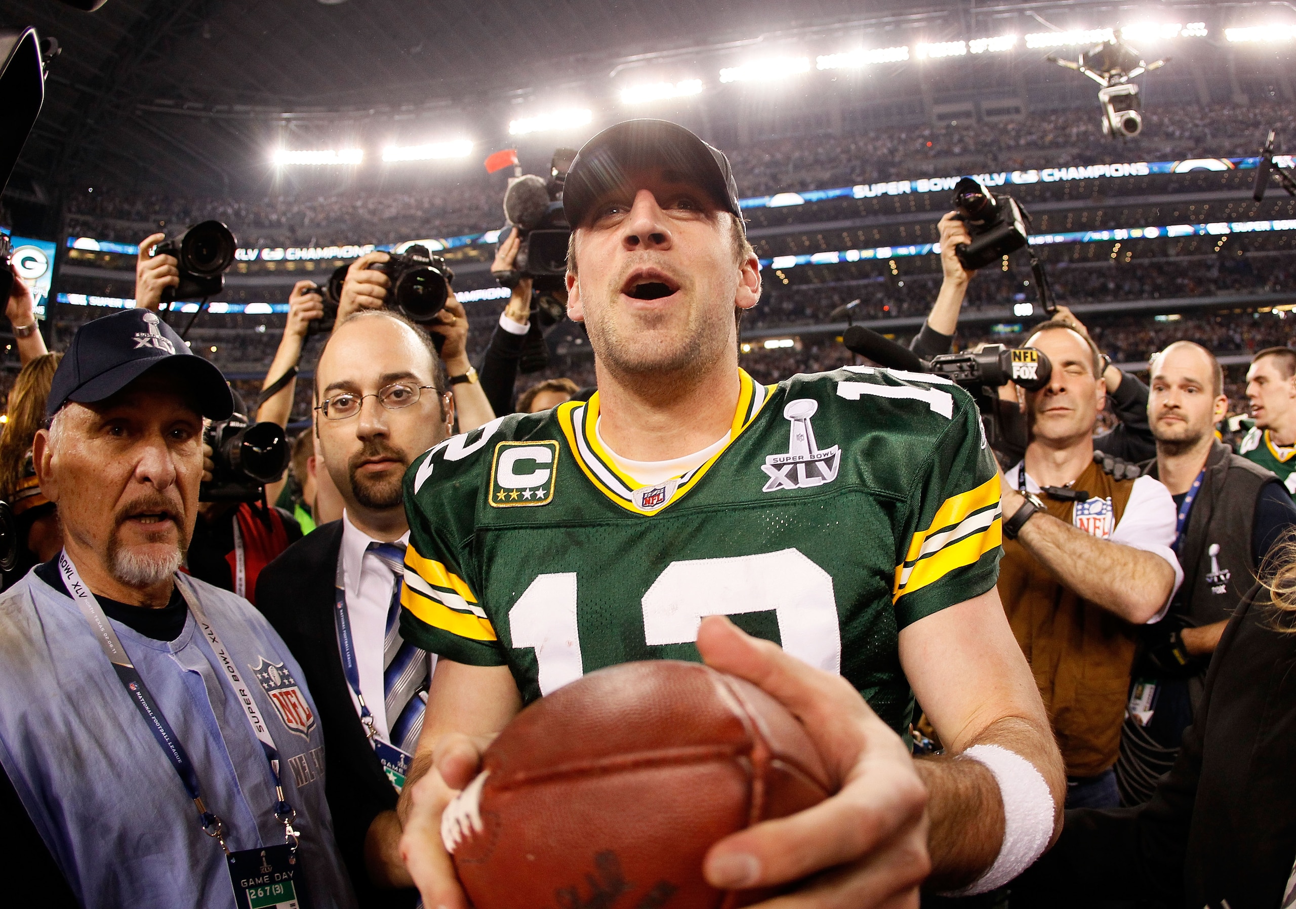 ARLINGTON, TX - FEBRUARY 06:  Super Bowl MVP Aaron Rodgers #12 of the Green Bay Packers celebrates after winning Super Bowl XLV 31-25 against the Pittsburgh Steelers at Cowboys Stadium on February 6, 2011 in Arlington, Texas.  (Photo by Kevin C. Cox/Getty
