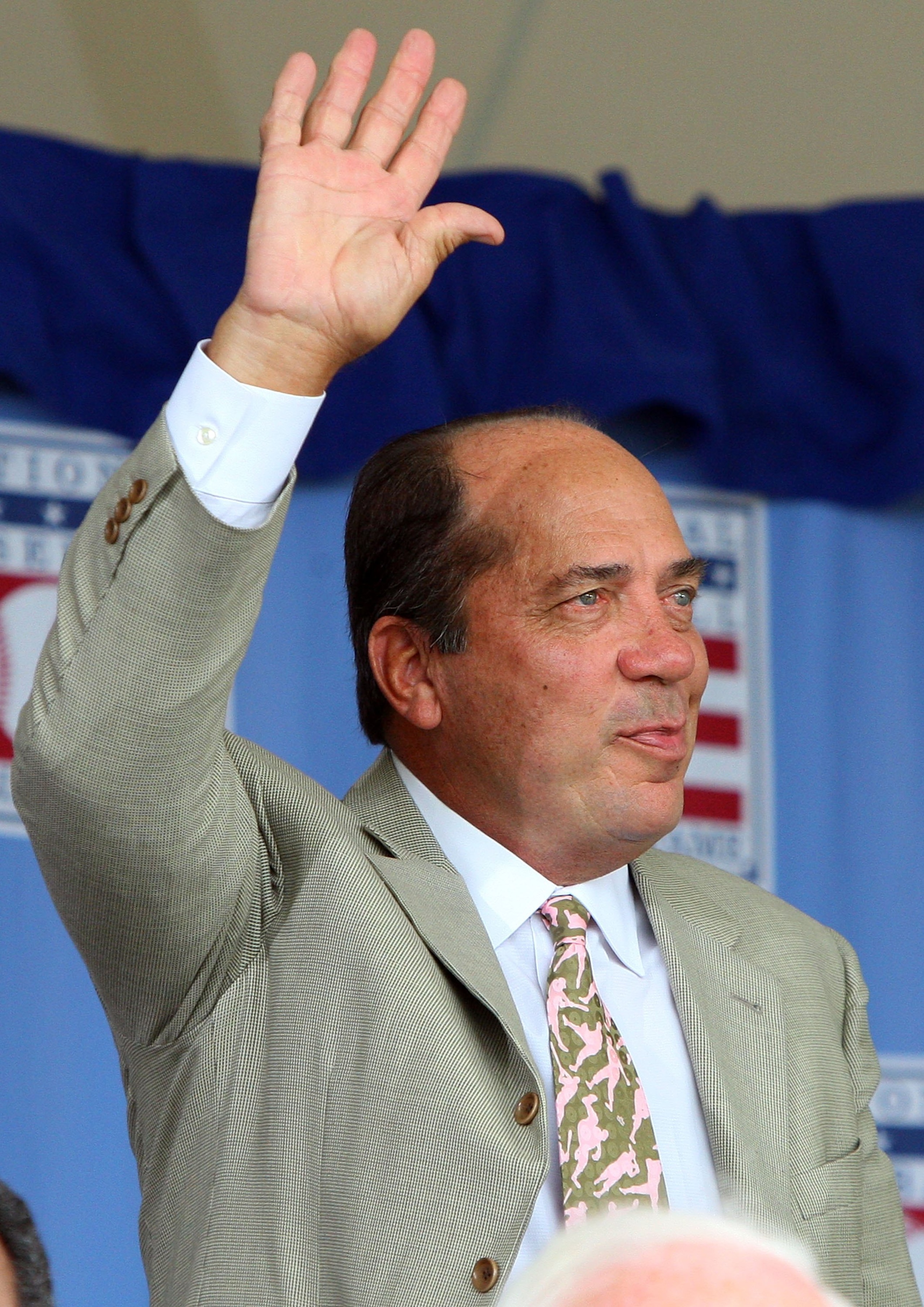 COOPERSTOWN, NY - JULY 26:  Hall of Famer Johnny Bench waves to the crowd as he is introduced at Clark Sports Center during the 2009  Baseball Hall of Fame induction ceremony on July 26, 2009 in Cooperstown, New York.  (Photo by Jim McIsaac/Getty Images)