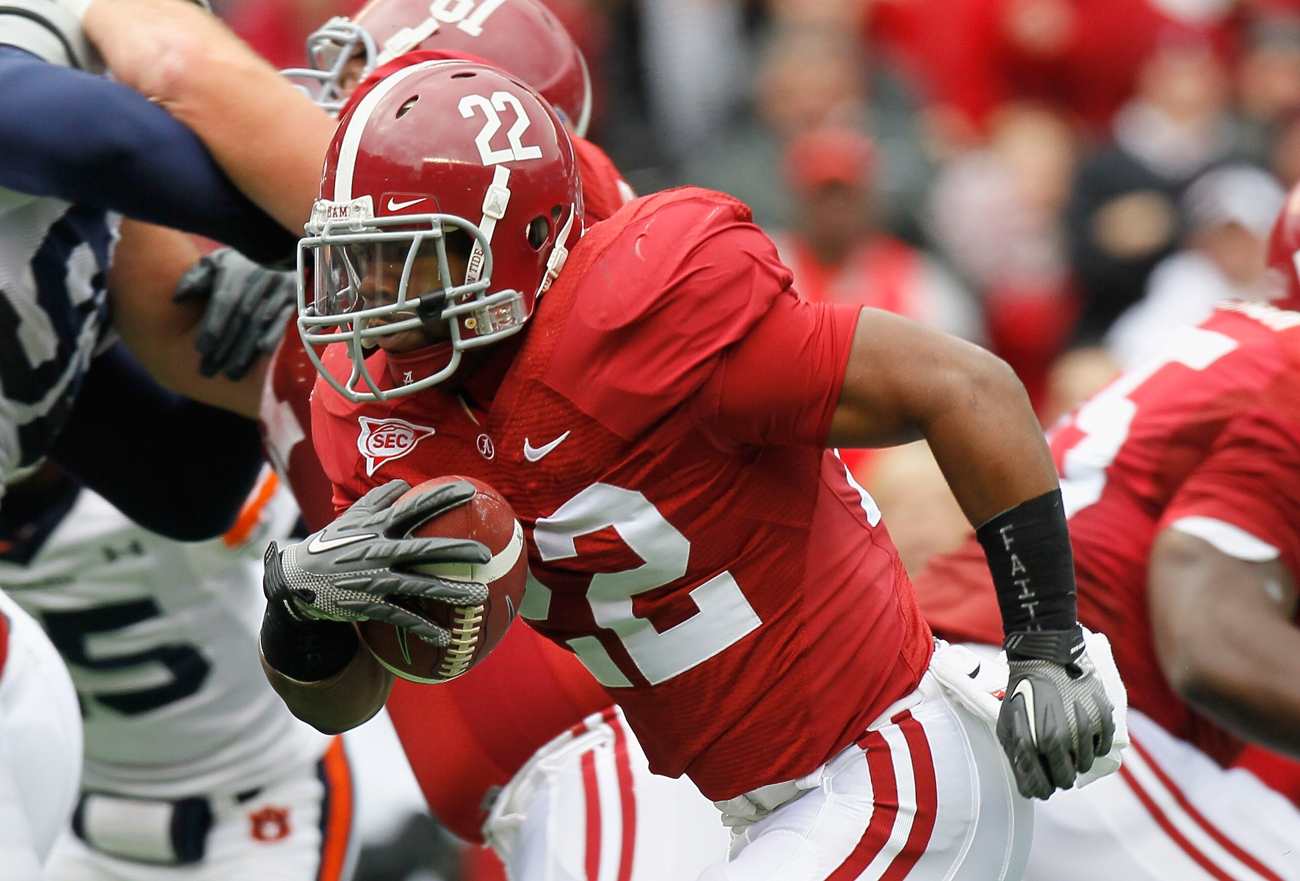 TUSCALOOSA, AL - NOVEMBER 26:  Mark Ingram #22 of the Alabama Crimson Tide rushes for a touchdown against the Auburn Tigers at Bryant-Denny Stadium on November 26, 2010 in Tuscaloosa, Alabama.  (Photo by Kevin C. Cox/Getty Images)
