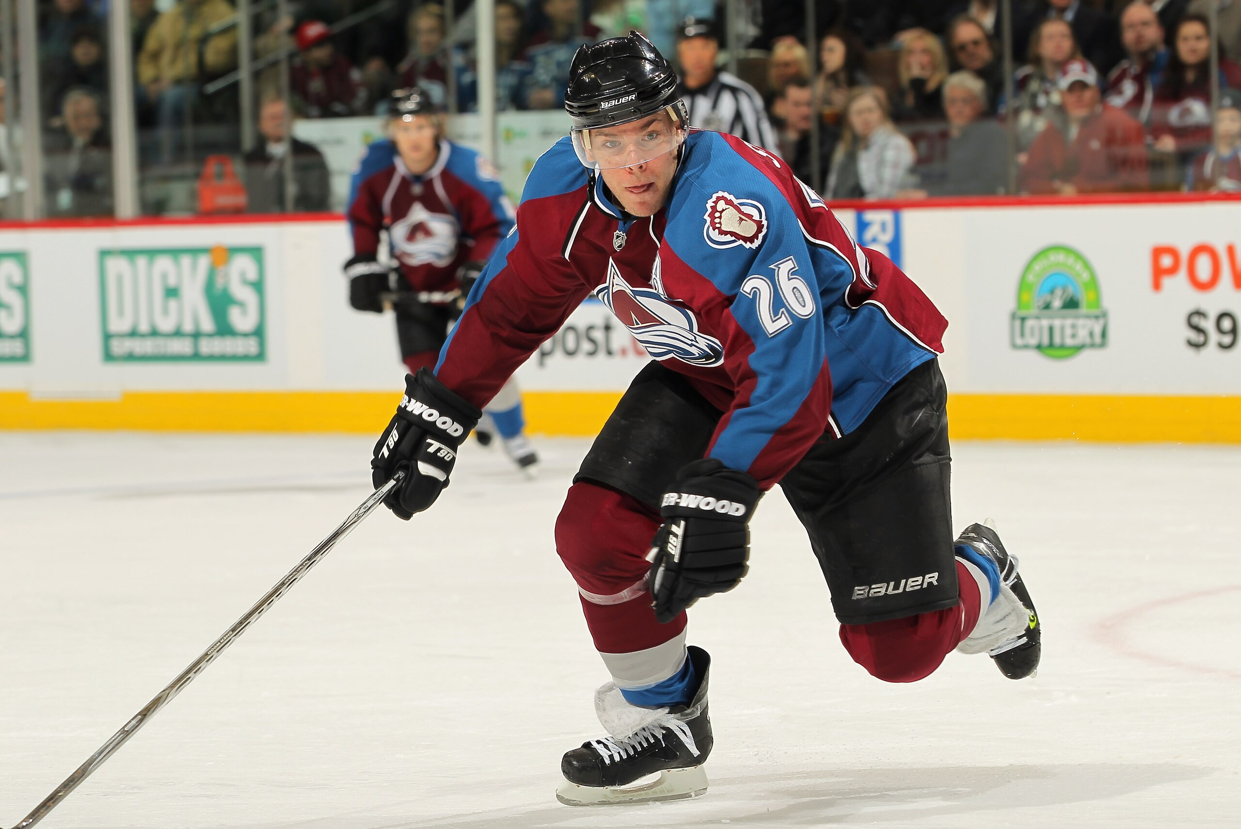 DENVER, CO - JANUARY 18:  Paul Stastny #26 of the Colorado Avalanche skates against the Vancouver Canucks at the Pepsi Center on January 18, 2011 in Denver, Colorado. The Avalanche defeated the Canucks 4-3 in overtime.  (Photo by Doug Pensinger/Getty Imag