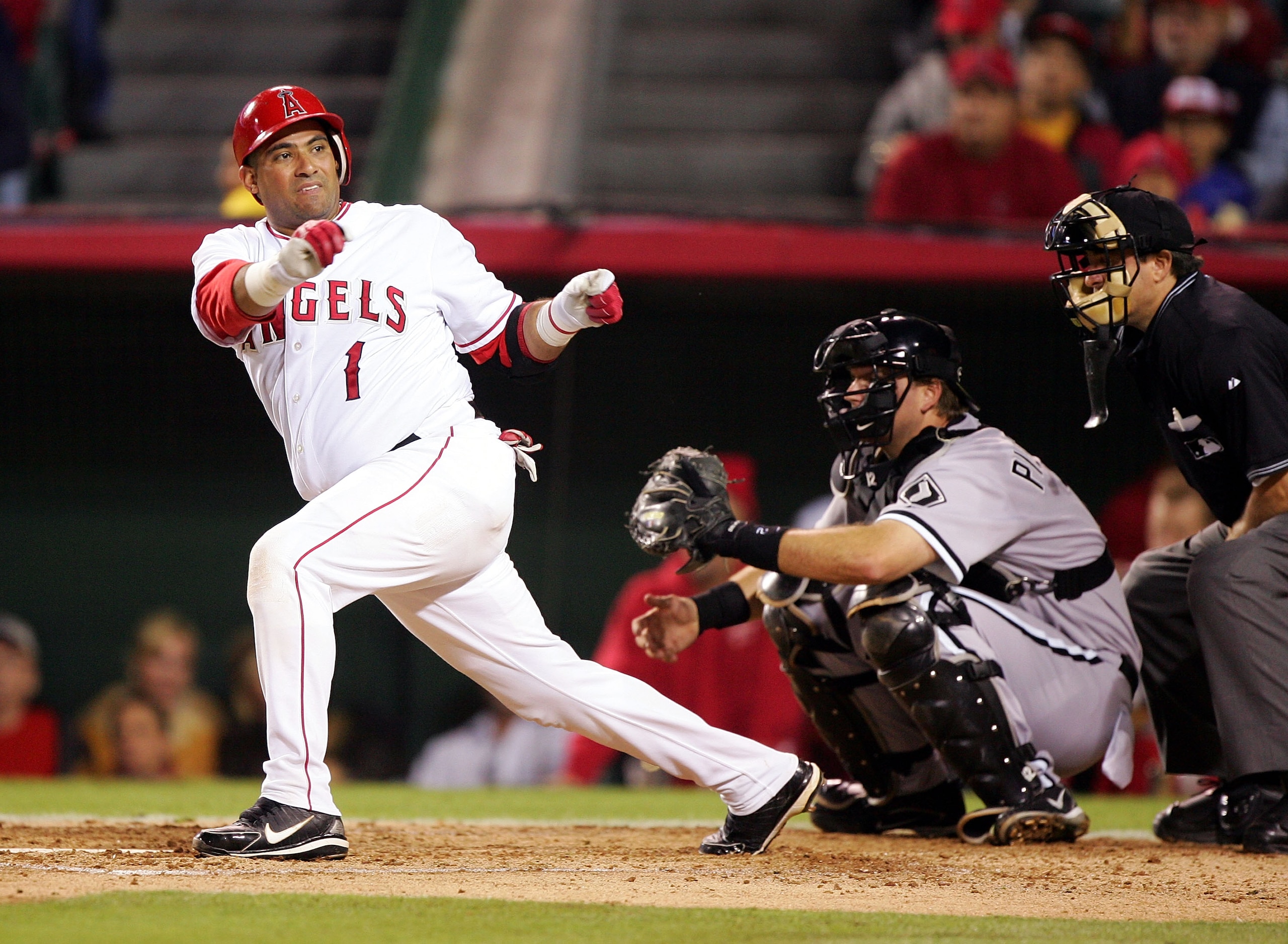 ANAHEIM, CA - OCTOBER 16:  Catcher Bengie Molina #1 of the Los Angeles Angels of Anaheim loses his bat in the fourth inning against the Chicago White Sox in Game Five of the American League Championship Series on October 16, 2005 at Angel Stadium in Anahe