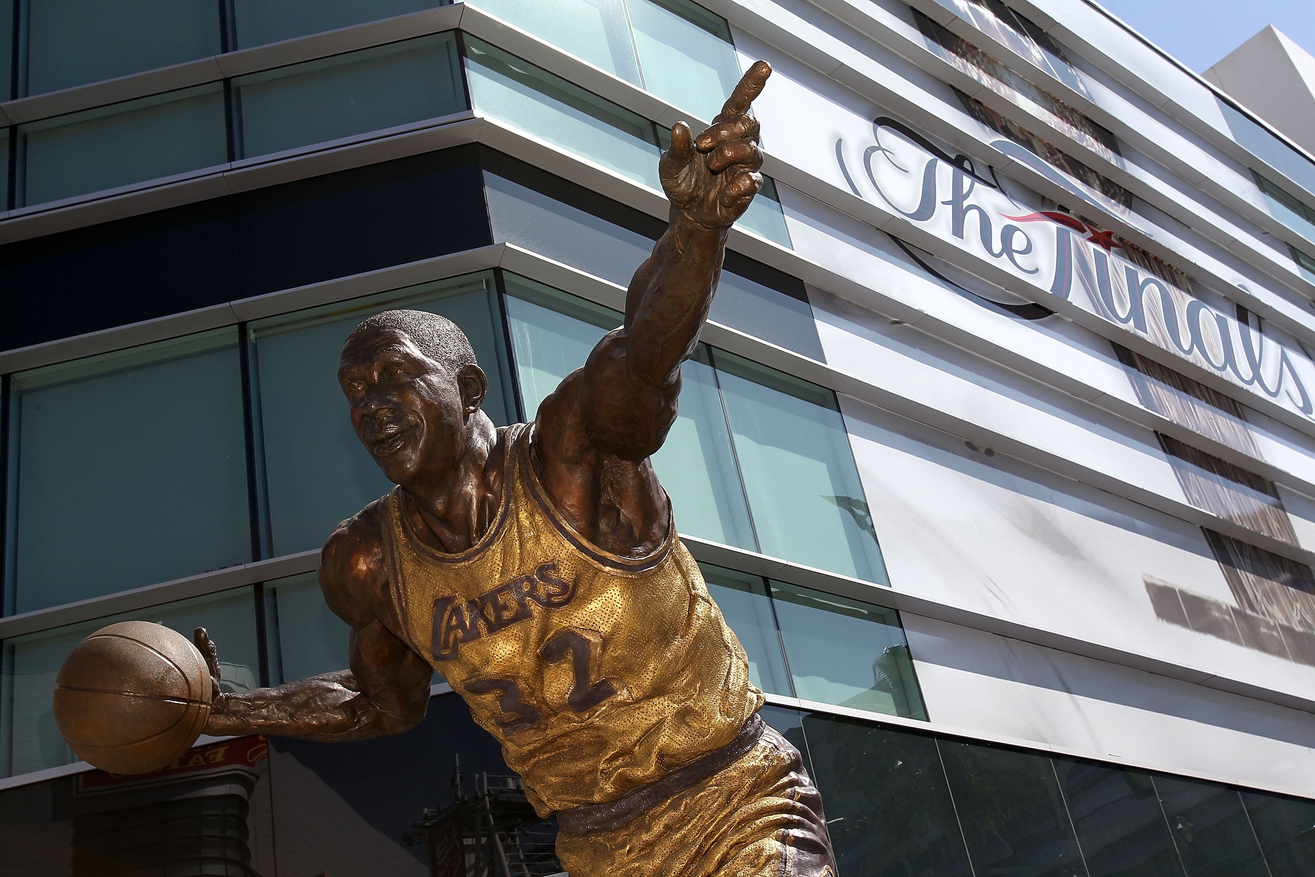 LOS ANGELES, CA - JUNE 06: A statue of Los Angeles Lakers' legend Magic Johnson is shown outside of Staples Center before Game Two of the 2010 NBA Finals between the Boston Celtics and the Los Angeles Lakers on June 6, 2010 in Los Angeles, California. NO LOS ANGELES, CA - JUNE 06: A statue of Los Angeles Lakers' legend Magic Johnson is shown outside of Staples Center before Game Two of the 2010 NBA Finals between the Boston Celtics and the Los Angeles Lakers on June 6, 2010 in Los Angeles, California. NO