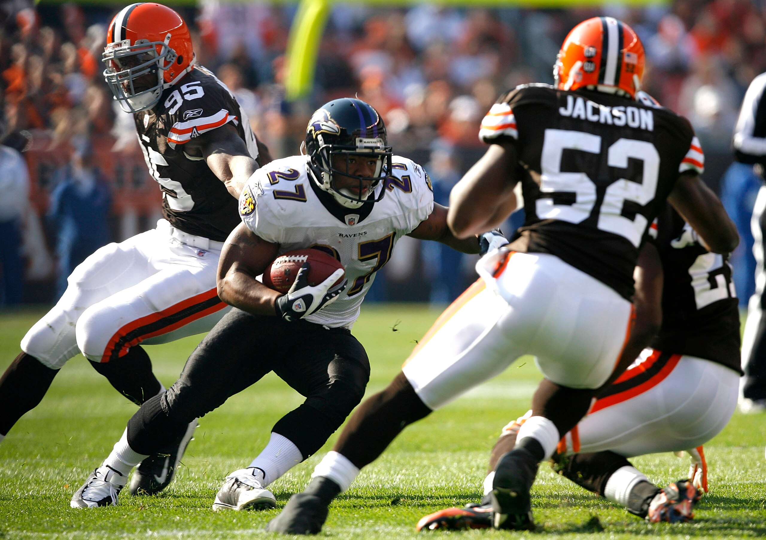 CLEVELAND - NOVEMBER 2:  Ray Rice #27 of the Baltimore Ravens runs the ball by Kamerion Wimbley #95 and D'Qwell Jackson #52 of the Cleveland Browns during the third quarter of their NFL game at Cleveland Browns Stadium November 2, 2008 in Cleveland, Ohio.