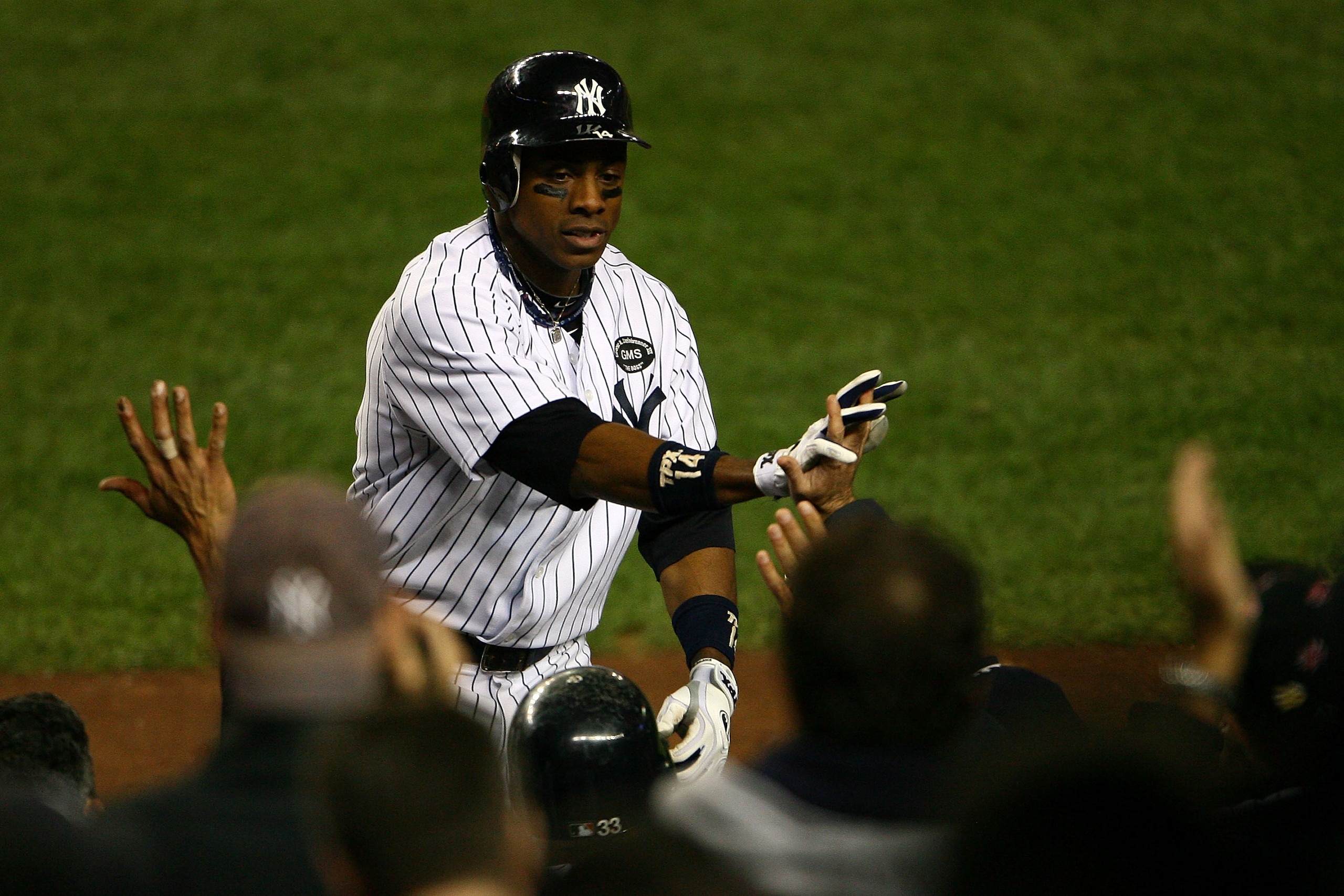 NEW YORK - OCTOBER 20:  Curtis Granderson #14 of the New York Yankees celebrates after hitting a solo home run in the bottom of the eighth inning against the Texas Rangers in Game Five of the ALCS during the 2010 MLB Playoffs at Yankee Stadium on October