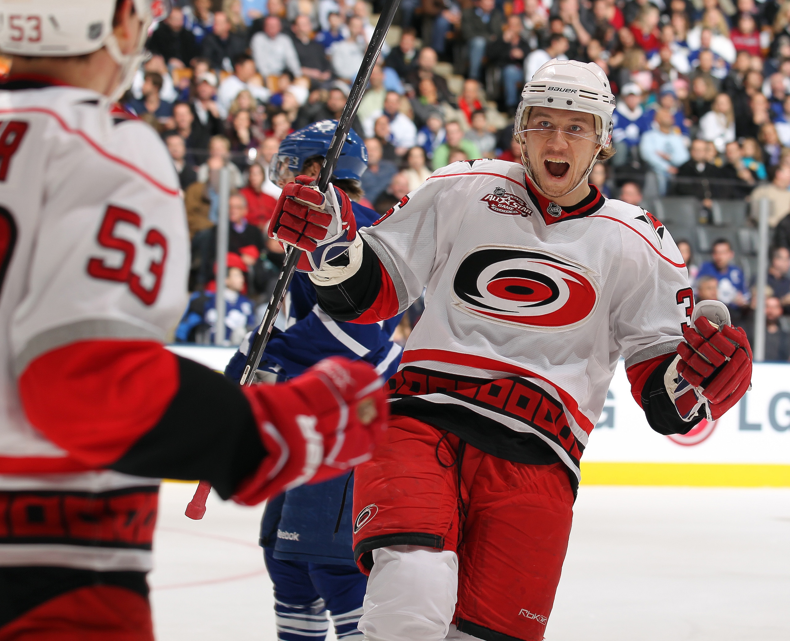 TORONTO,ON - DECEMBER 28:  Jussi Jokinen #36 of the Carolina Hurricanes congratulates teammate Jeff Skinner #53 on his goal in a game against the Toronto Maple Leafs on December 28, 2010 at the Air Canada Centre in Toronto, Ontario. (Photo by Claus Anders