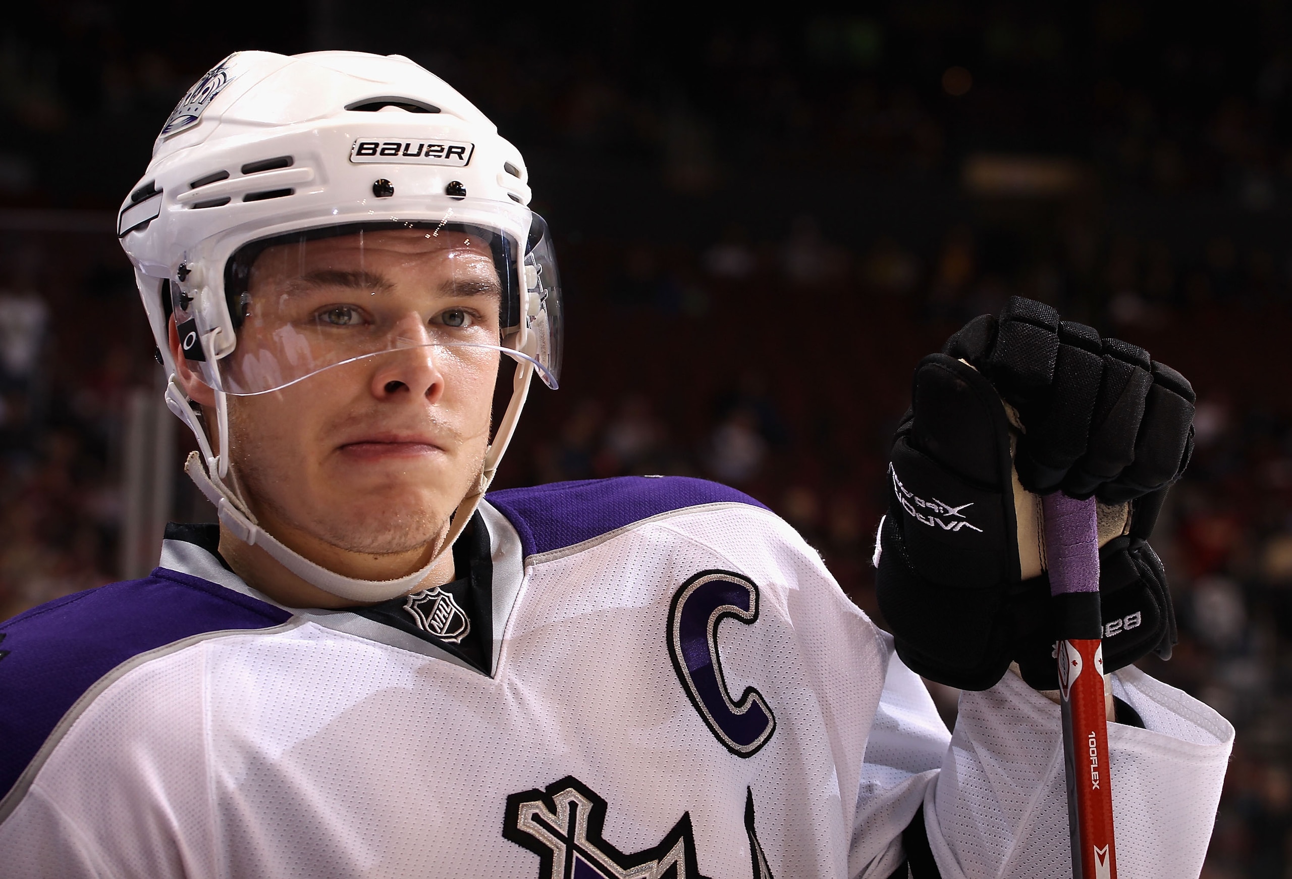 GLENDALE, AZ - JANUARY 22:  Dustin Brown #23 of the Los Angeles Kings leans on the bench during the NHL game against the Phoenix Coyotes at Jobing.com Arena on January 22, 2011 in Glendale, Arizona.  The Kings defeated the Coyotes 4-3.  (Photo by Christia