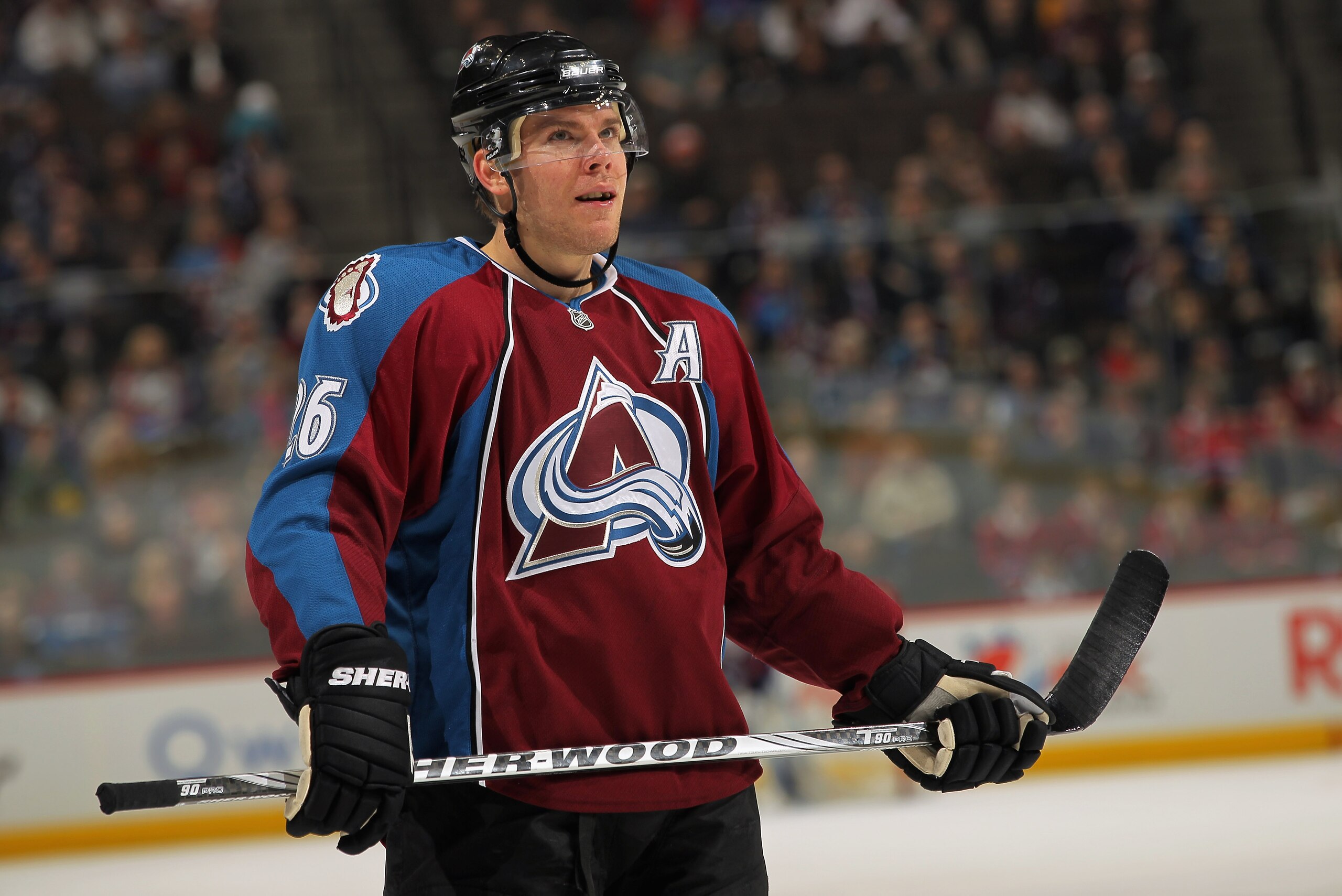 DENVER, CO - JANUARY 18:  Paul Stastny #26 of the Colorado Avalanche looks on during a break in the action against the Vancouver Canucks at the Pepsi Center on January 18, 2011 in Denver, Colorado. The Avalanche defeated the Canucks 4-3 in overtime.  (Pho