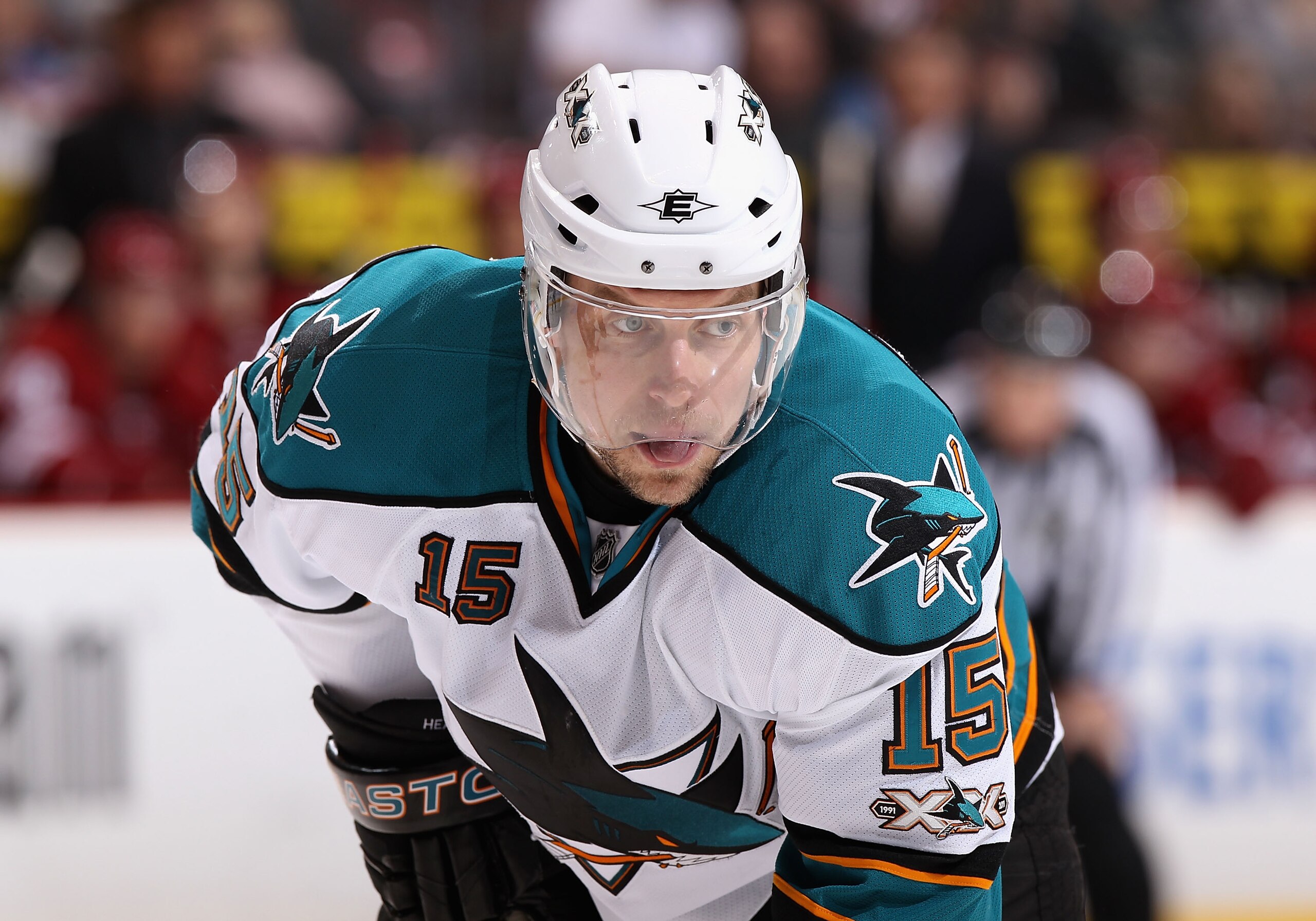 GLENDALE, AZ - JANUARY 17:  Dany Heatley #15 of the San Jose Sharks awaits a face off during the NHL game against the Phoenix Coyotes at Jobing.com Arena on January 17, 2011 in Glendale, Arizona.  The Sharks defeated the Coyotes 4-2.  (Photo by Christian