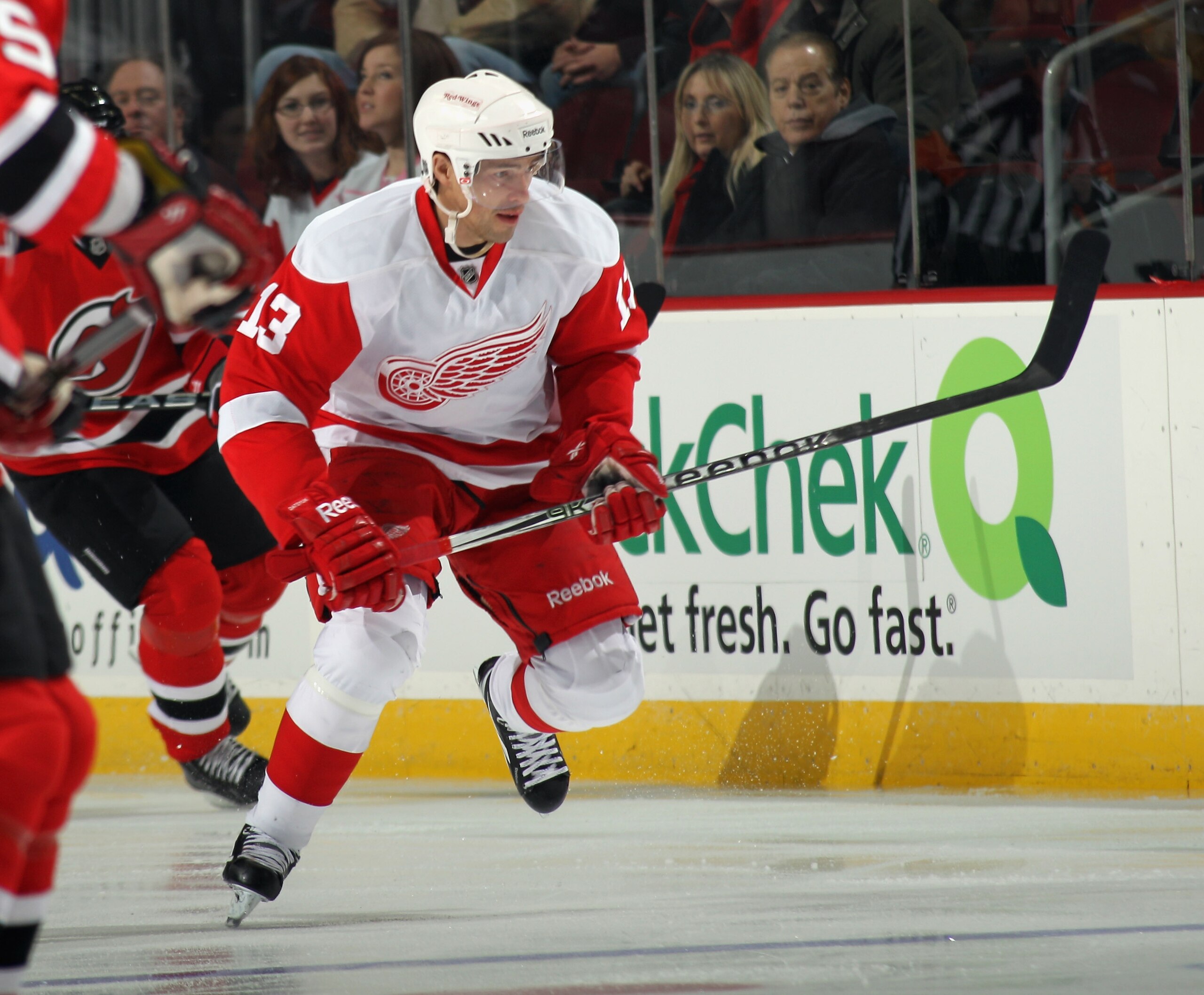 NEWARK, NJ - DECEMBER 11:  Pavel Datsyuk #13 of the Detroit Red Wings skates against the New Jersey Devils at the Prudential Center on December 11, 2010 in Newark, New Jersey. The Red Wings defeated the the Devils 4-1.  (Photo by Bruce Bennett/Getty Image
