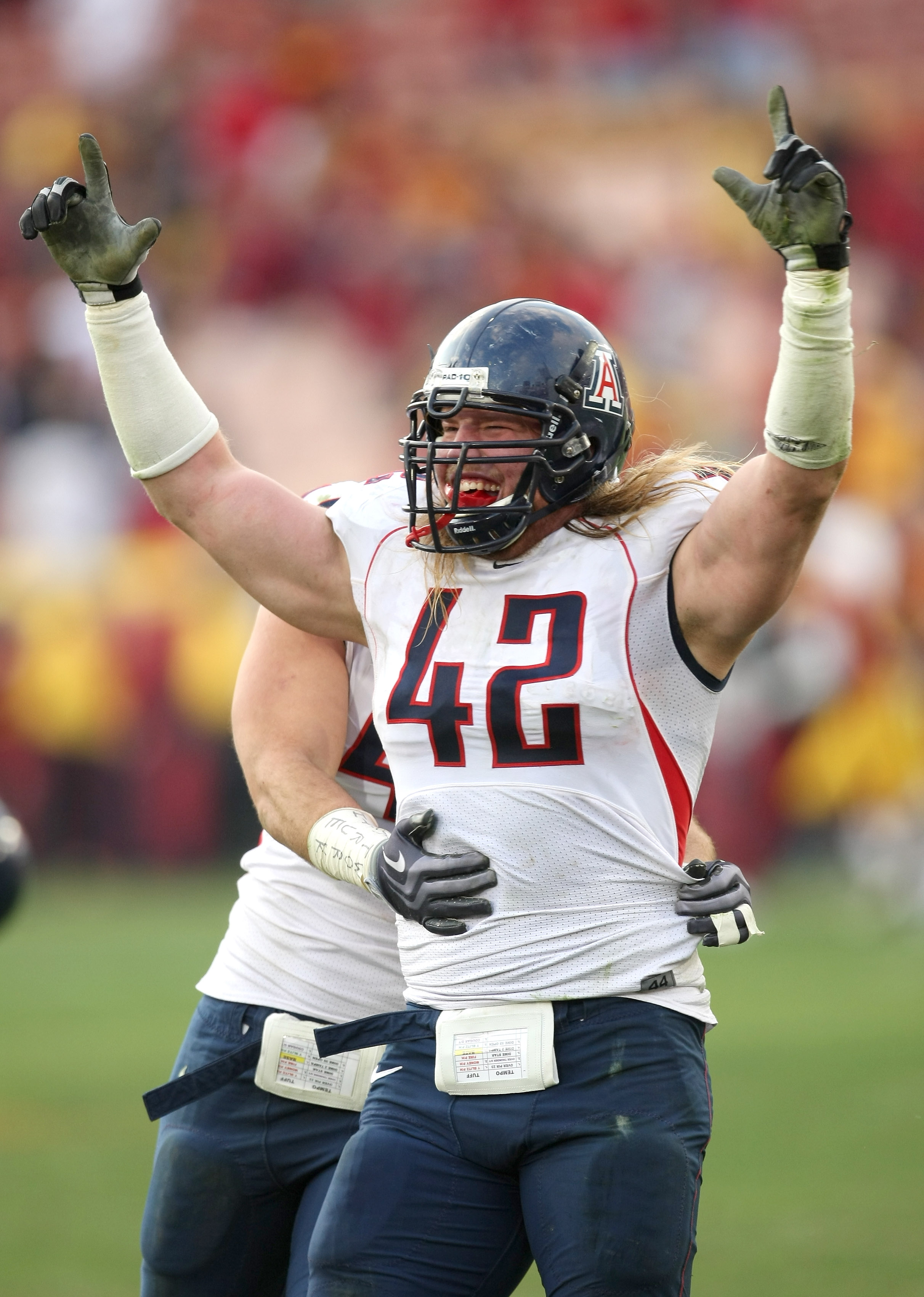 LOS ANGELES, CA - DECEMBER 05:  Defensive end Brooks Reed #42 of the Arizona Wildcats celebrates after stopping the USC Trojans on the final play on December 5, 2009 at the Los Angeles Coliseum in Los Angeles, California. Arizona won 21-17.  (Photo by Ste
