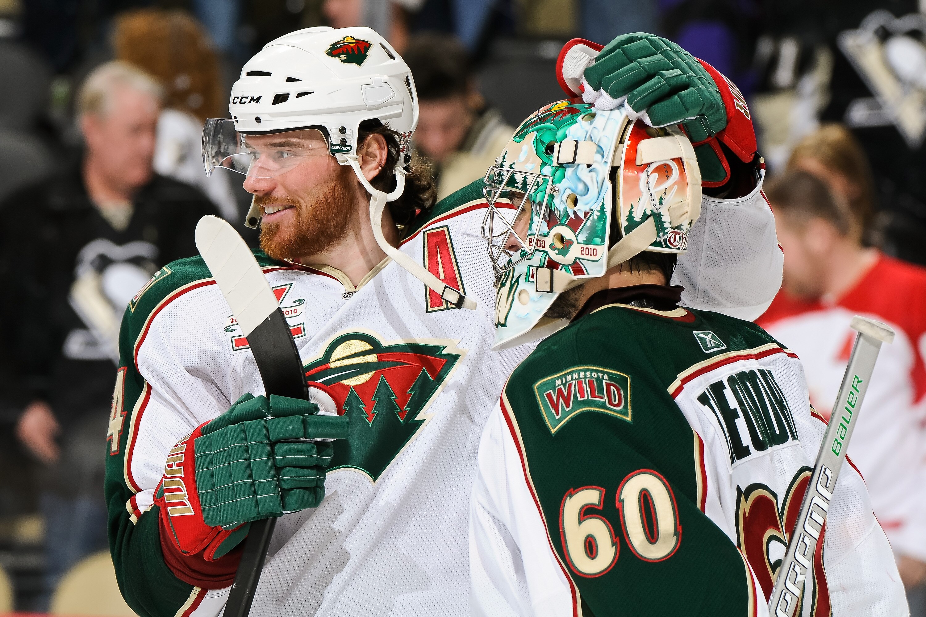 PITTSBURGH, PA - JANUARY 08:  Goaltender Jose Theodore #60 of the Minnesota Wild is congratulated by teammate Martin Havlat #24 after posting a 4-0 shutout win against the Pittsburgh Penguins on January 8, 2011 at CONSOL Energy Center in Pittsburgh, Penns