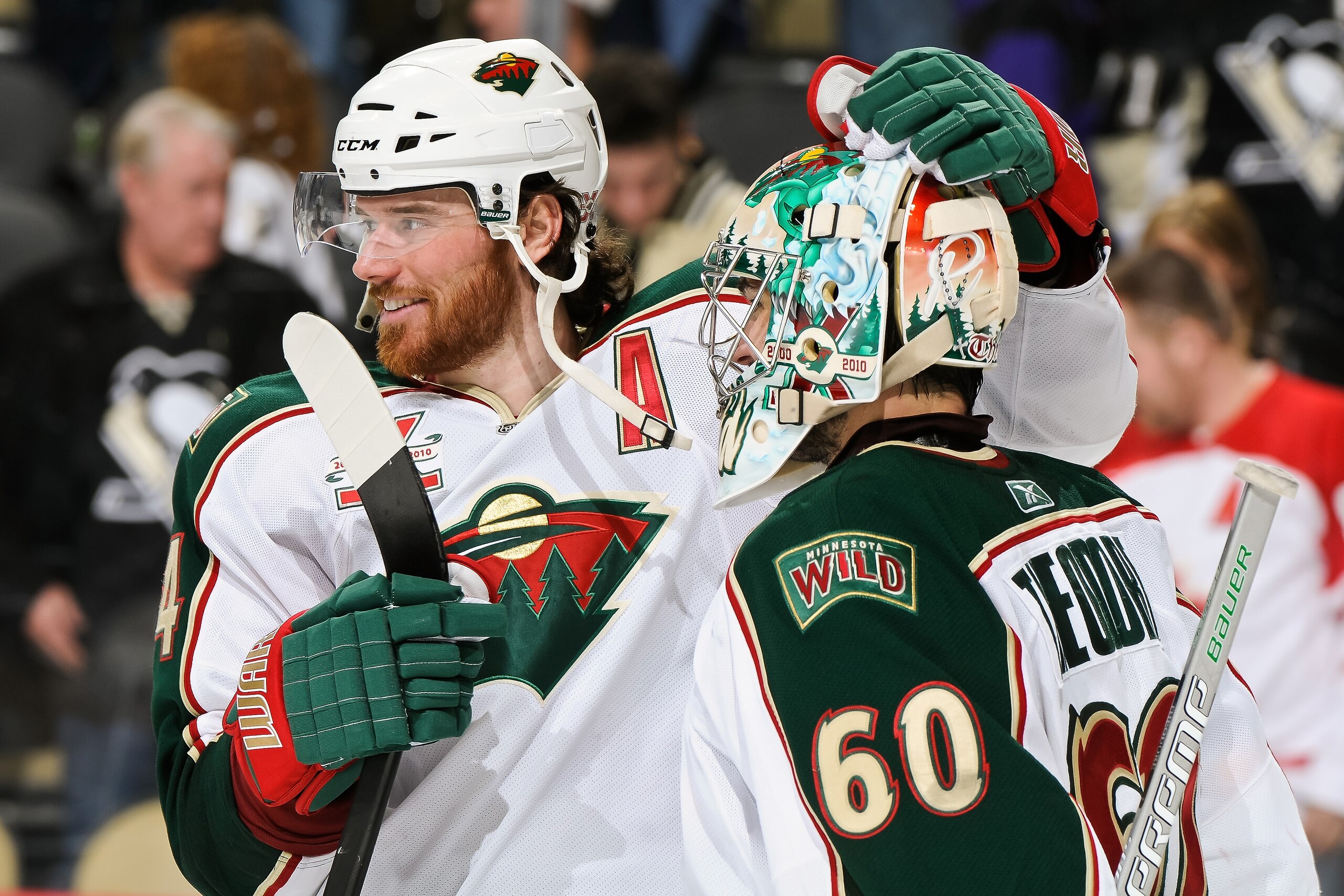 PITTSBURGH, PA - JANUARY 08:  Goaltender Jose Theodore #60 of the Minnesota Wild is congratulated by teammate Martin Havlat #24 after posting a 4-0 shutout win against the Pittsburgh Penguins on January 8, 2011 at CONSOL Energy Center in Pittsburgh, Penns