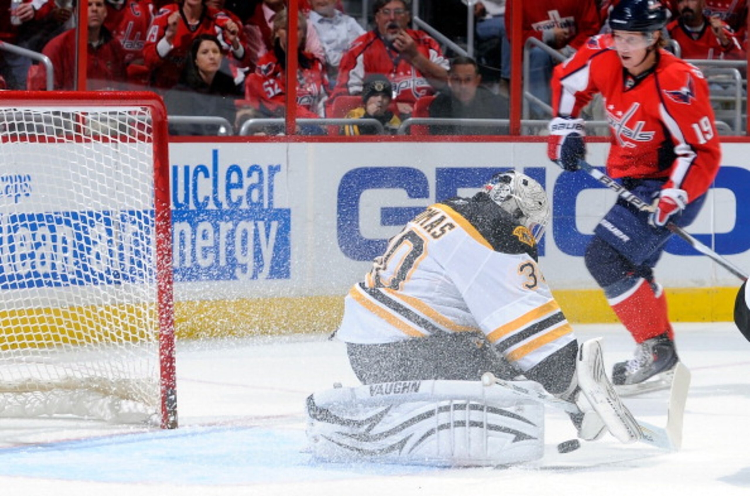 WASHINGTON - OCTOBER 19:  Tim Thomas #30 of the Boston Bruins makes a save against Nicklas Backstrom #19 of the Washington Capitals at the Verizon Center on October 19, 2010 in Washington, DC.  (Photo by Greg Fiume/Getty Images)