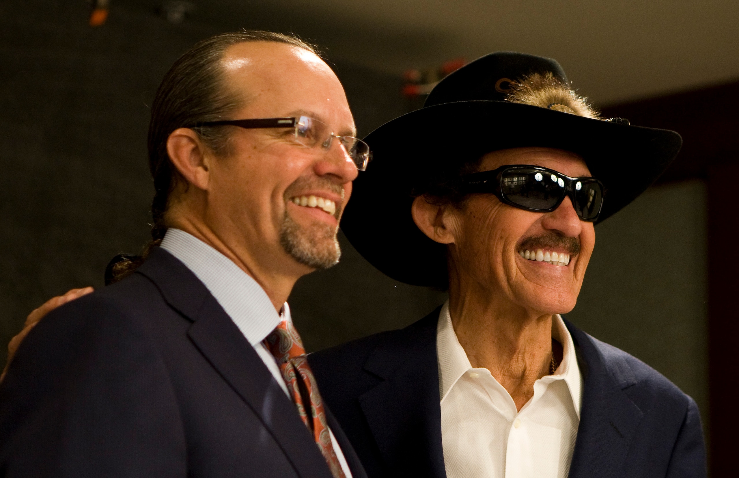 CHARLOTTE, NC - MAY 23: Richard Petty has his picture taken with his son Kyle Petty before the Inaugural Induction Ceremony at the NASCAR Hall of Fame on May 23, 2010 in Charlotte, North Carolina. (Photo by Chris Keane/Getty Images for NASCAR) CHARLOTTE, NC - MAY 23: Richard Petty has his picture taken with his son Kyle Petty before the Inaugural Induction Ceremony at the NASCAR Hall of Fame on May 23, 2010 in Charlotte, North Carolina. (Photo by Chris Keane/Getty Images for NASCAR)